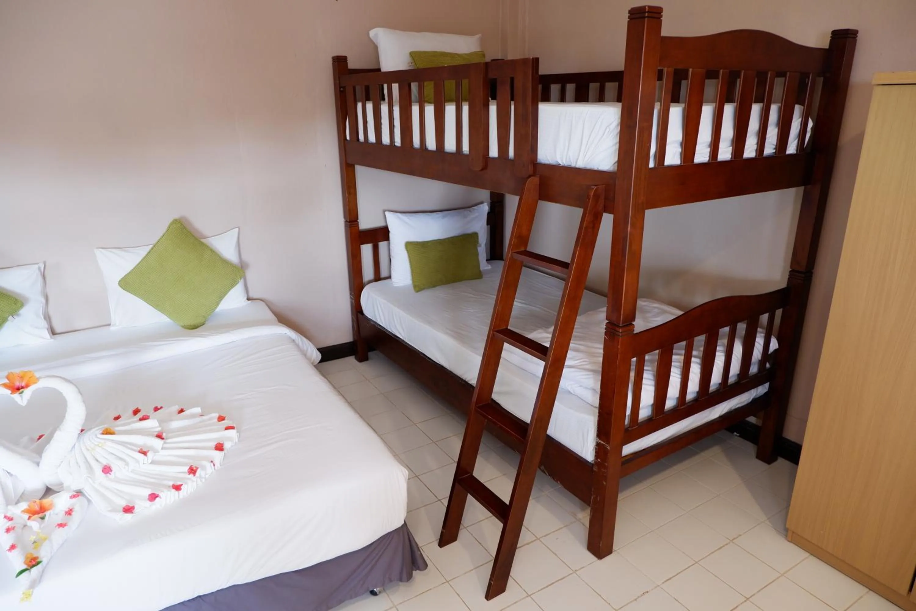 Bed in Kata Beachwalk Hotel and Bungalows