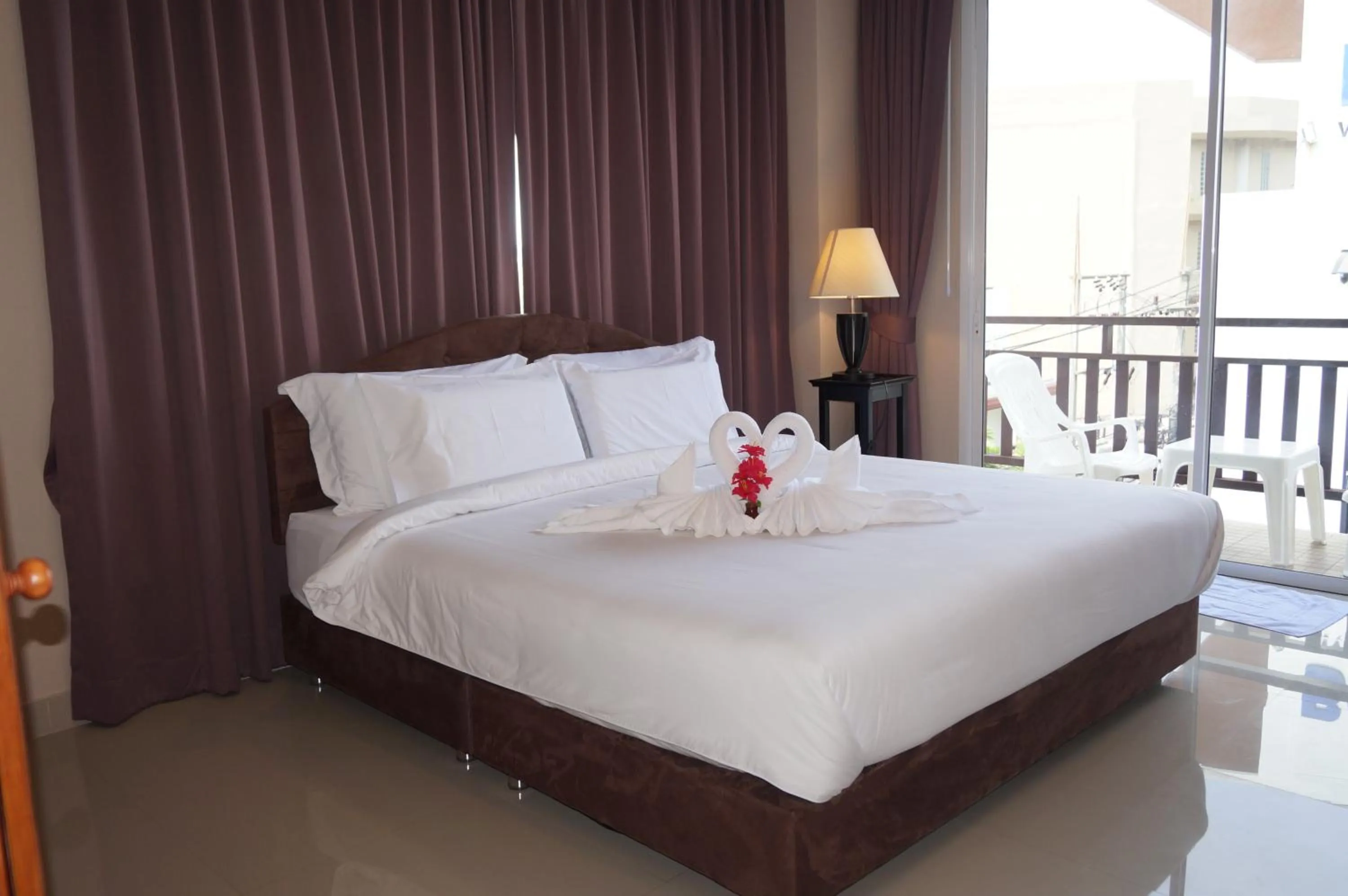 Bed in Kata Beachwalk Hotel and Bungalows