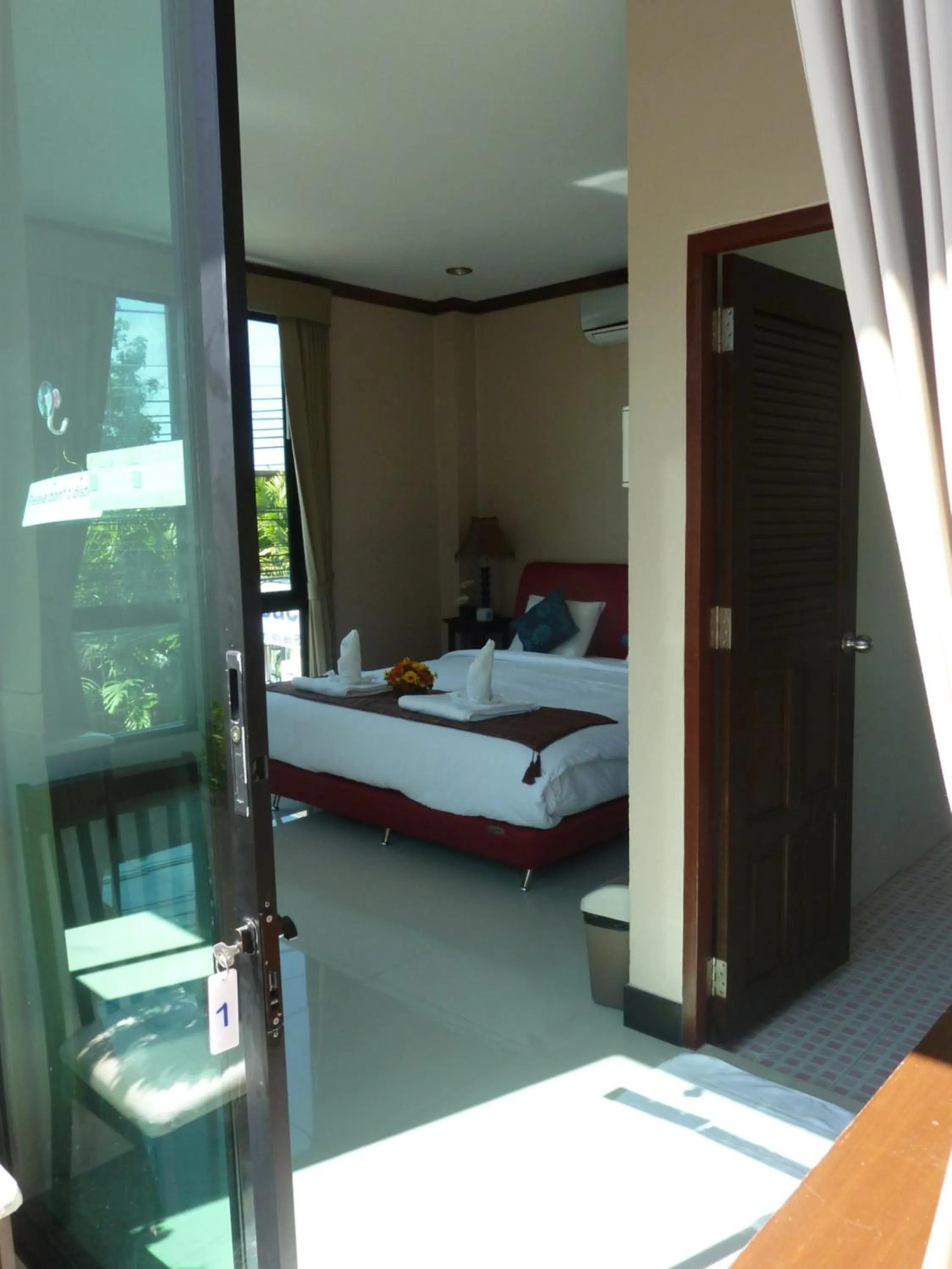 Bed in Kata Beachwalk Hotel and Bungalows