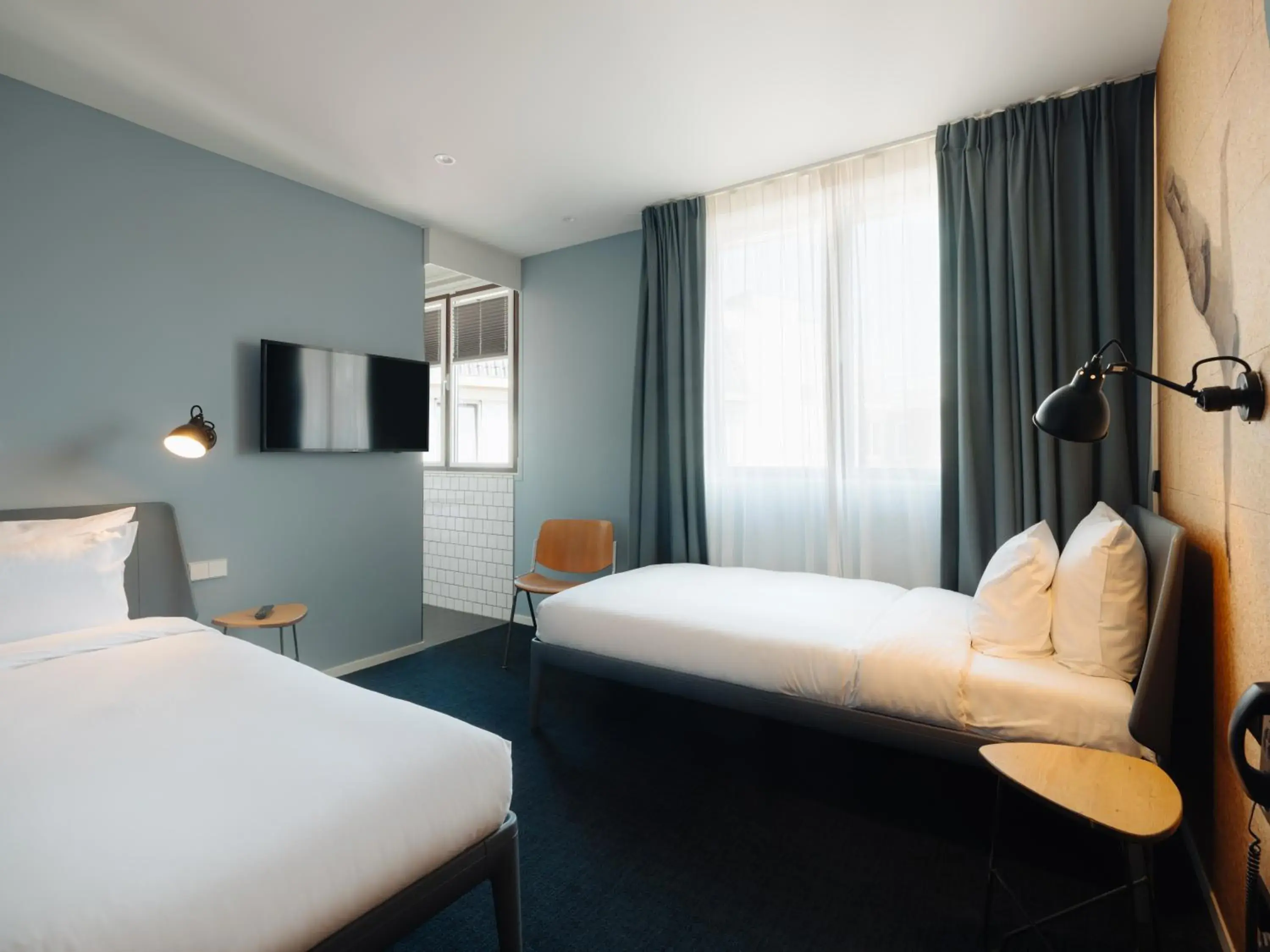 Bed in Conscious Hotel The Tire Station Bed in Conscious Hotel The Tire Station