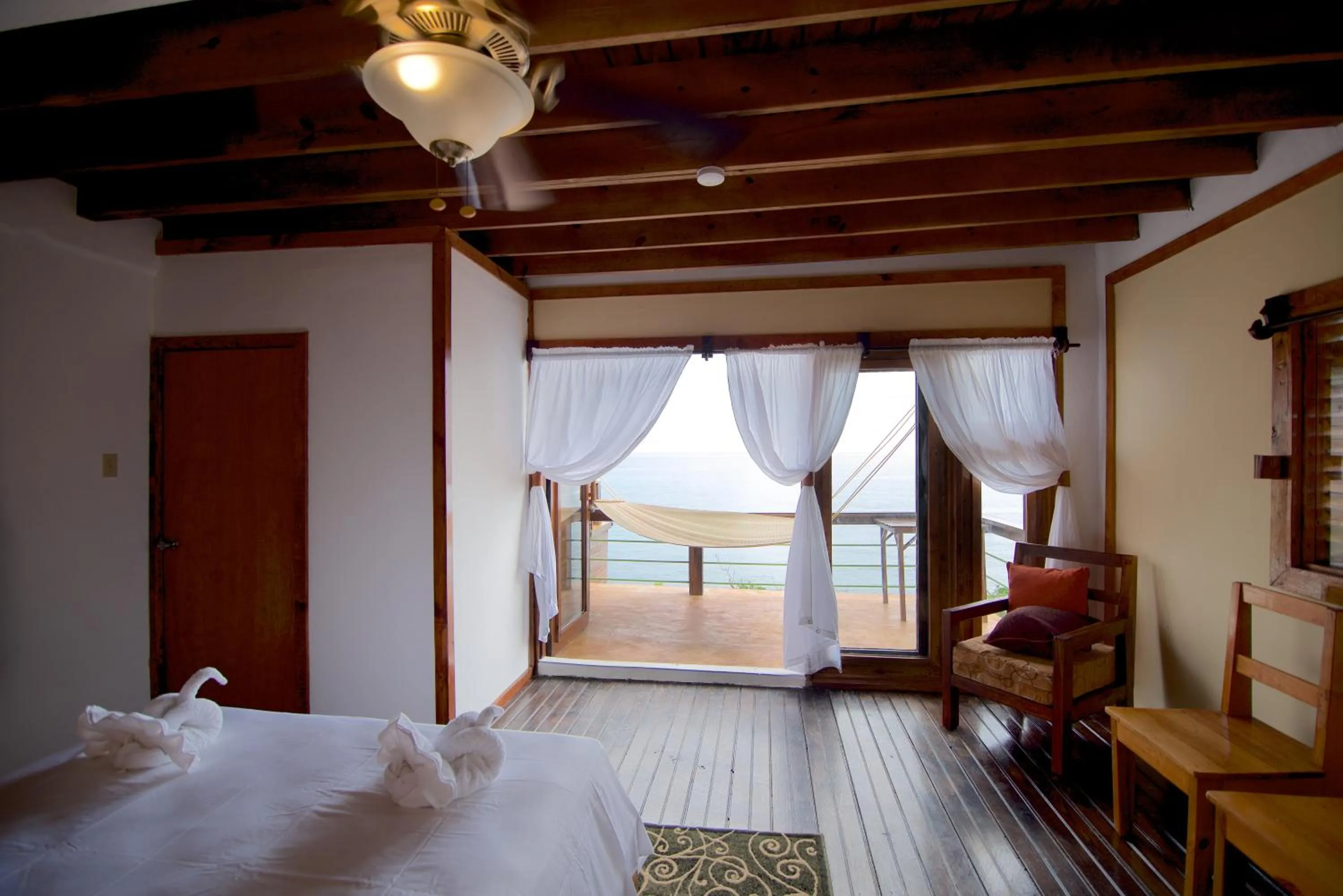 Patio, Bed in The Sea Cliff Hotel Resort & Spa