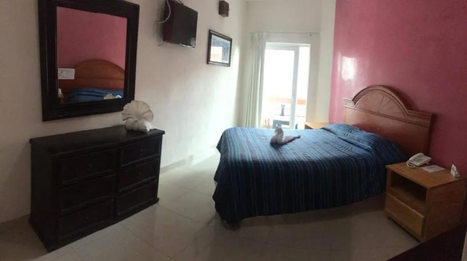 Bed in Casa del Parque Vallarta