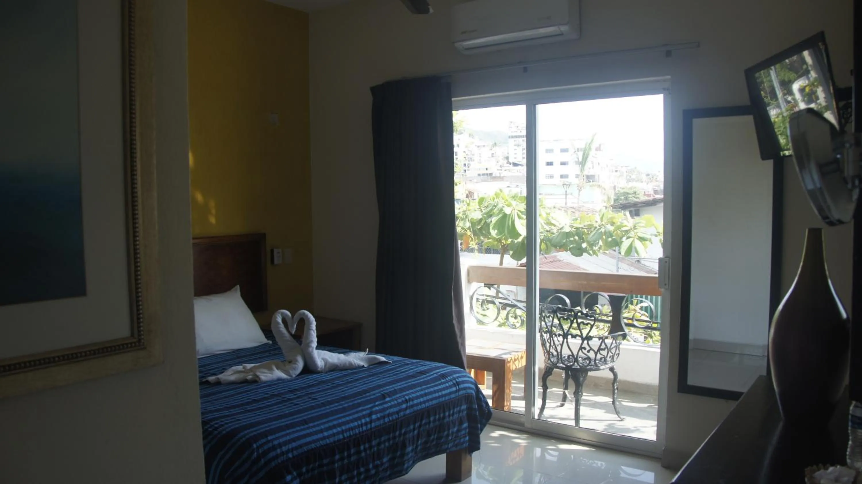 Bed in Casa del Parque Vallarta