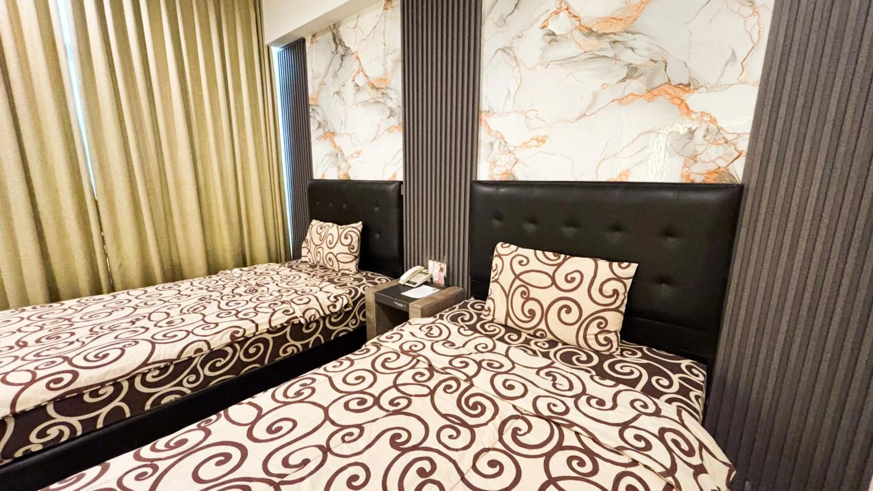 Bed in UTC Hotel Semarang