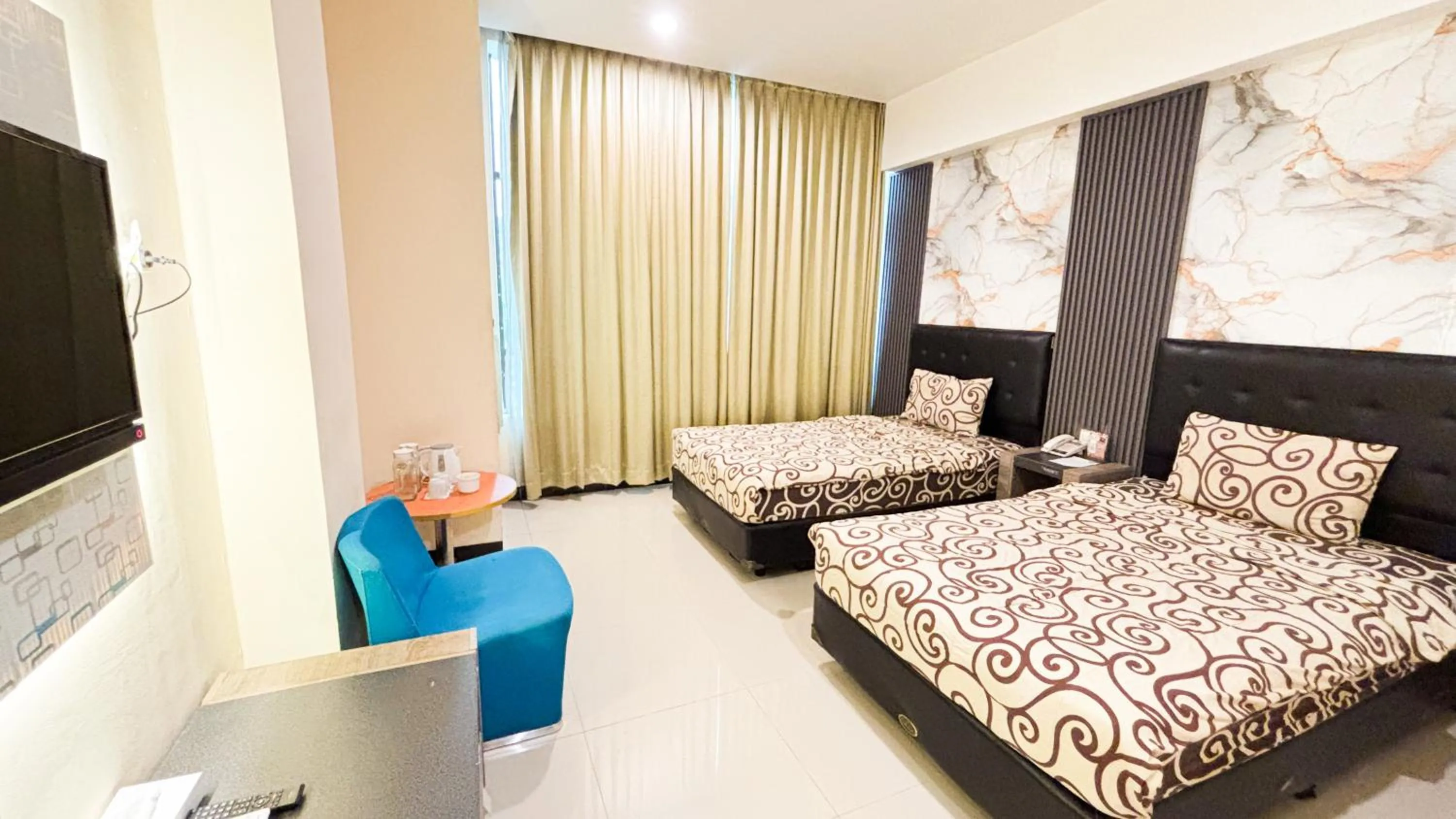 Bed in UTC Hotel Semarang