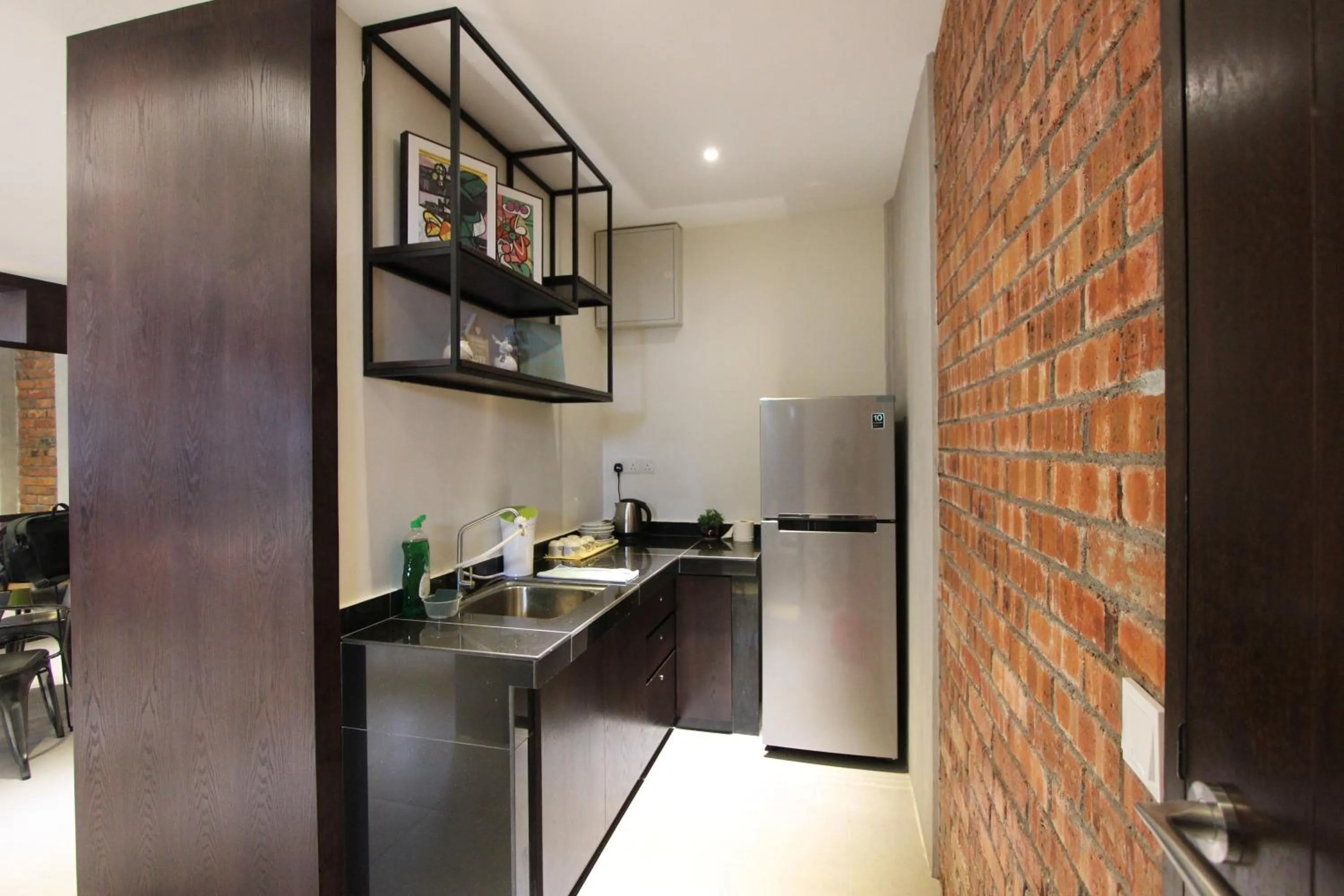 Kitchen or kitchenette in Backyard Rio Melaka