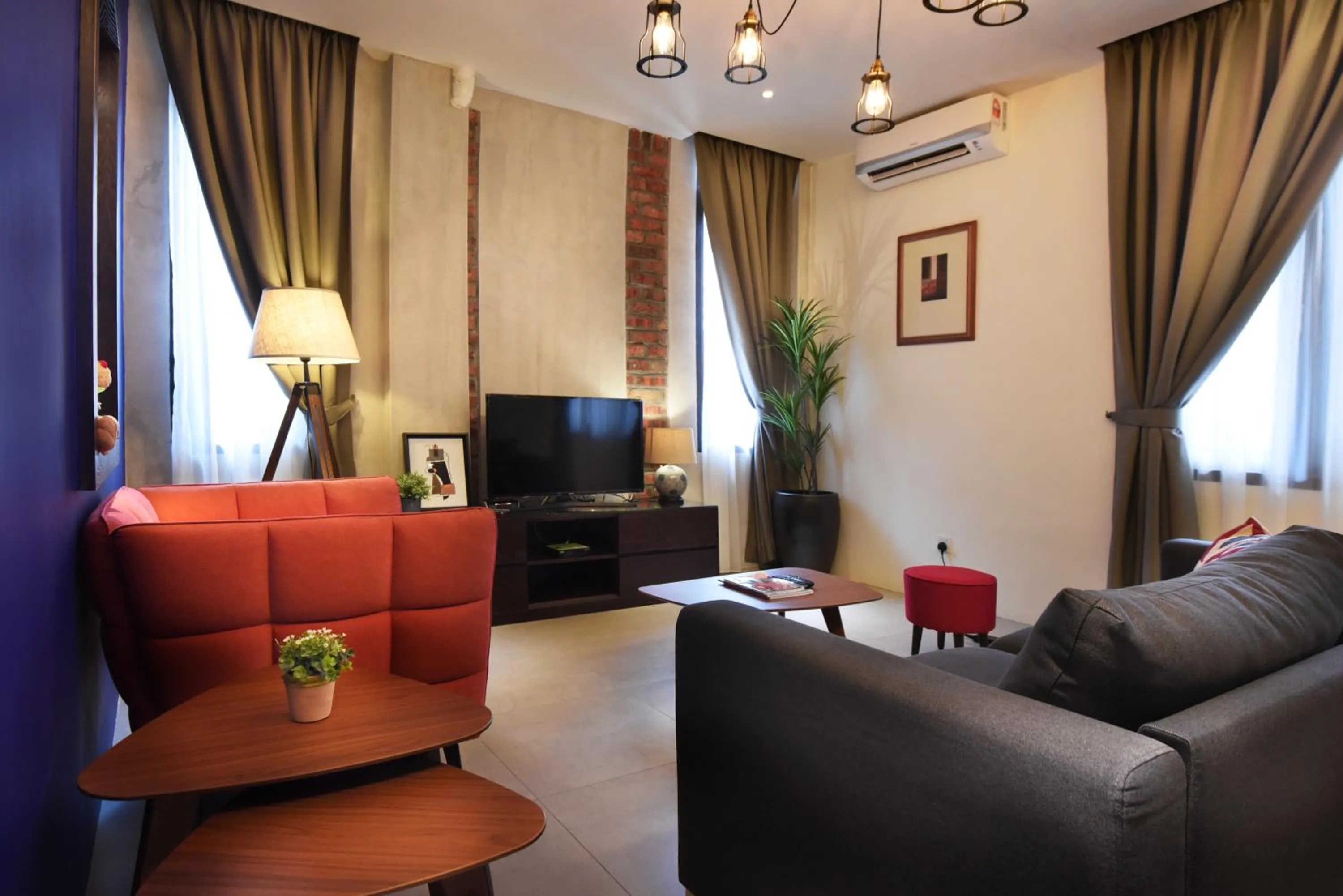 Communal lounge/ TV room in Backyard Rio Melaka