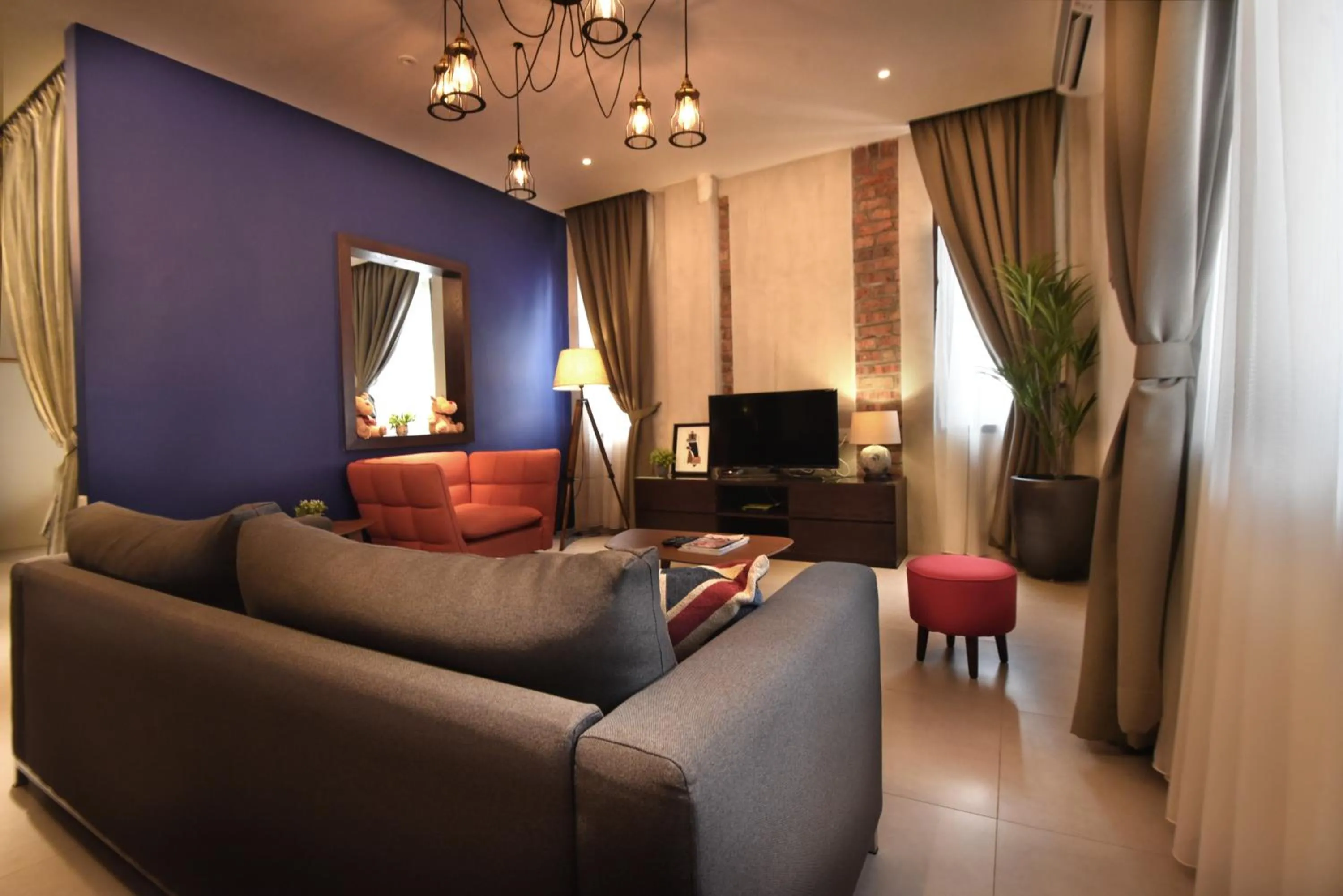 Communal lounge/ TV room in Backyard Rio Melaka
