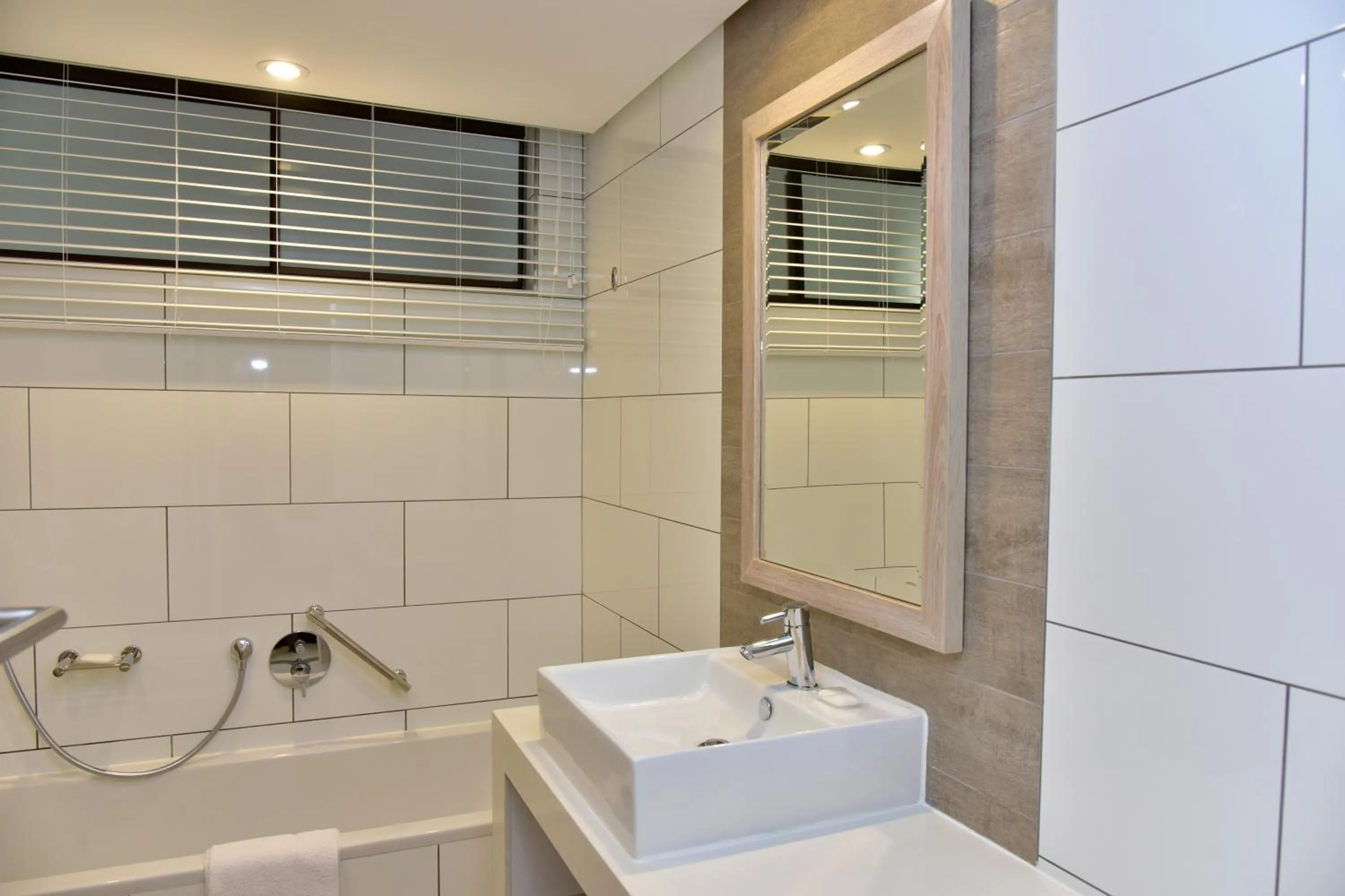 Bathroom in La Lucia Sands Beach Resort