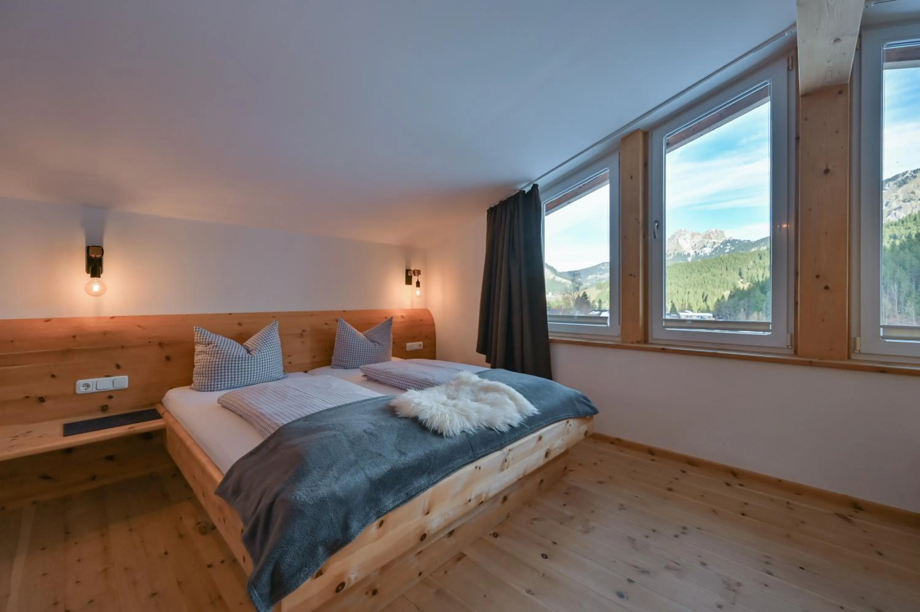 Bedroom, Bed in Braito's Seaside Lodges und Suites, Ferienhäuser und Ferienwohnungen