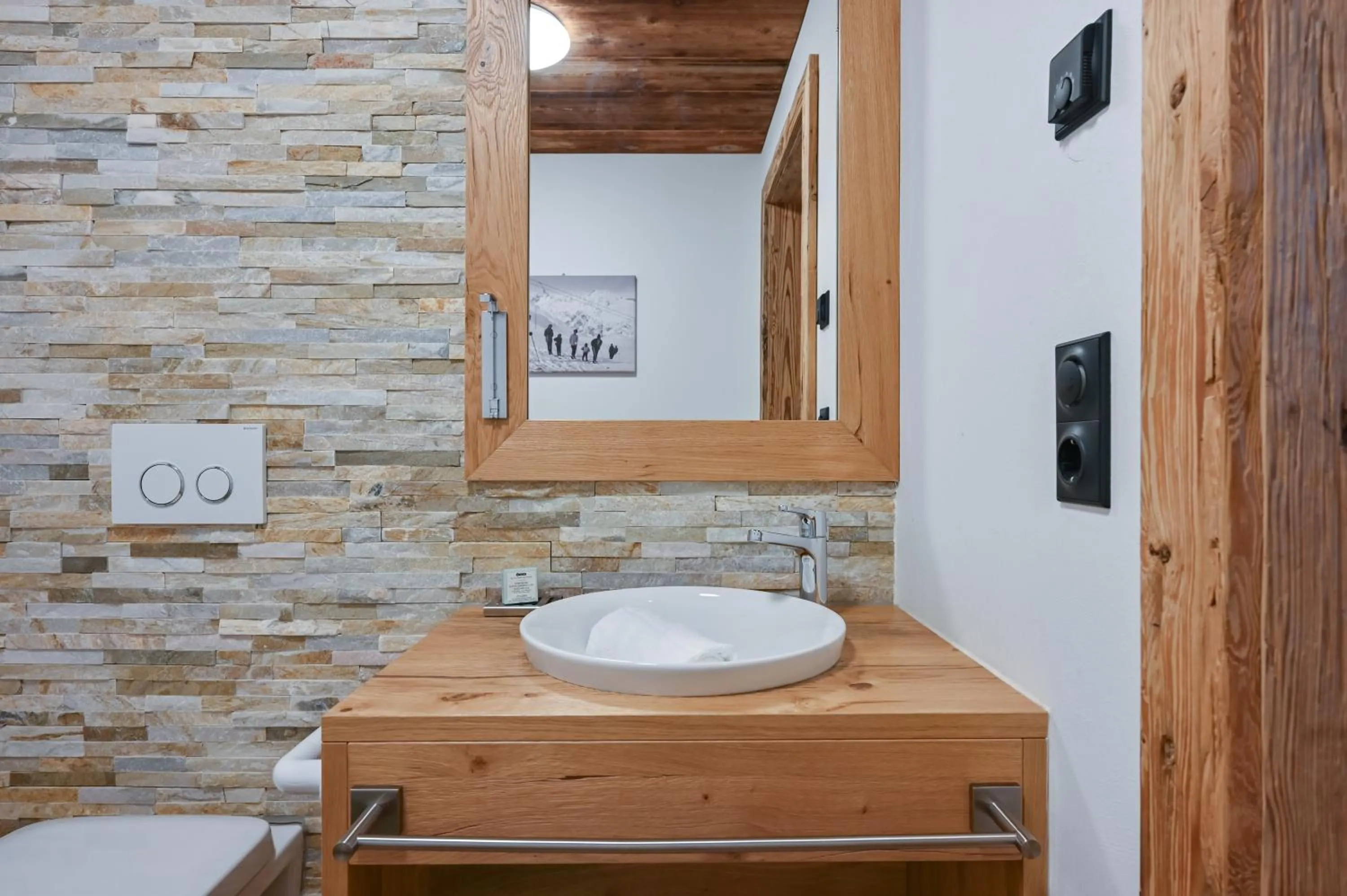 Toilet in Braito's Seaside Lodges und Suites, Ferienhäuser und Ferienwohnungen