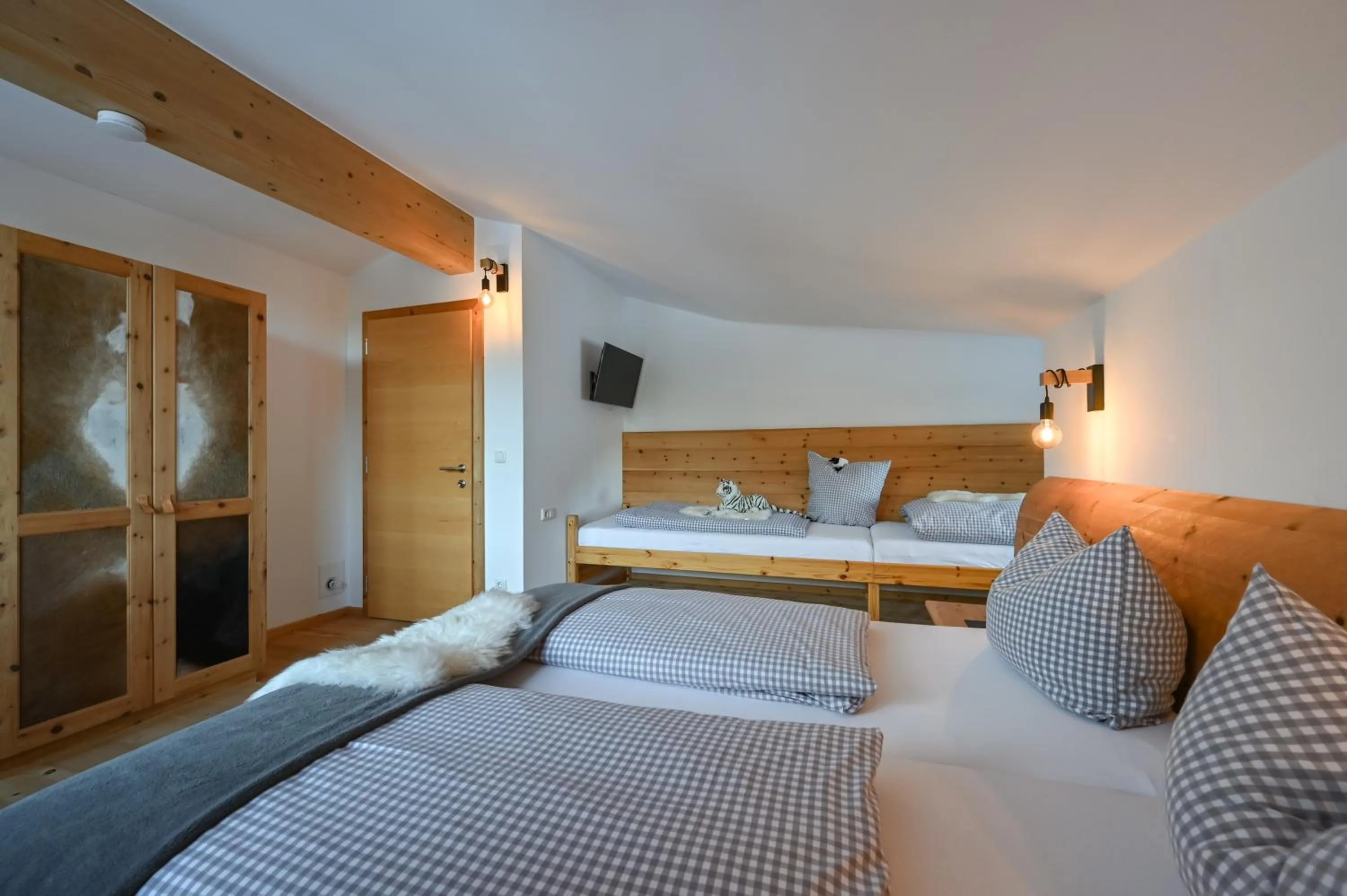 Bedroom, Bed in Braito's Seaside Lodges und Suites, Ferienhäuser und Ferienwohnungen