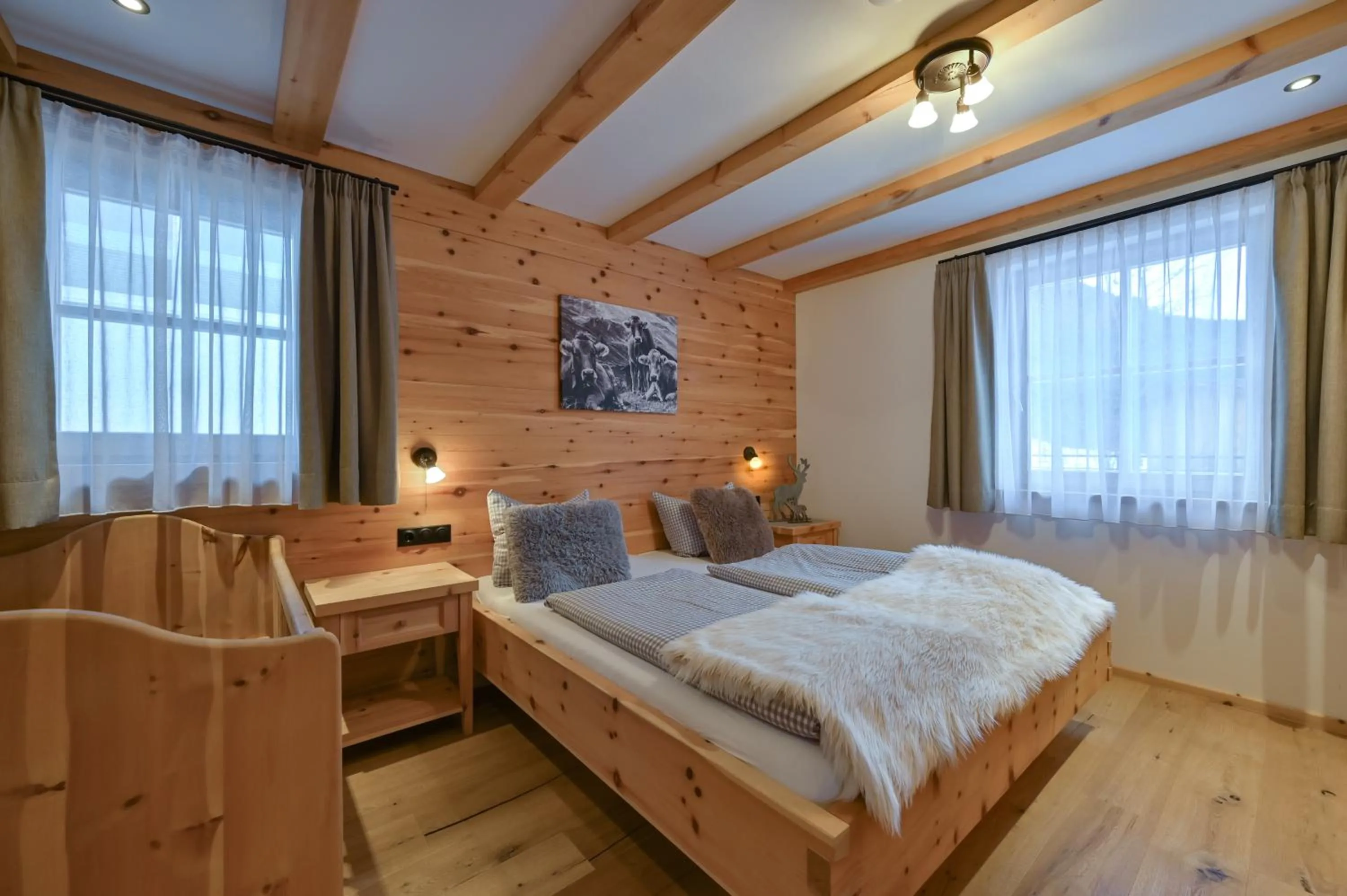 Bedroom, Bed in Braito's Seaside Lodges und Suites, Ferienhäuser und Ferienwohnungen