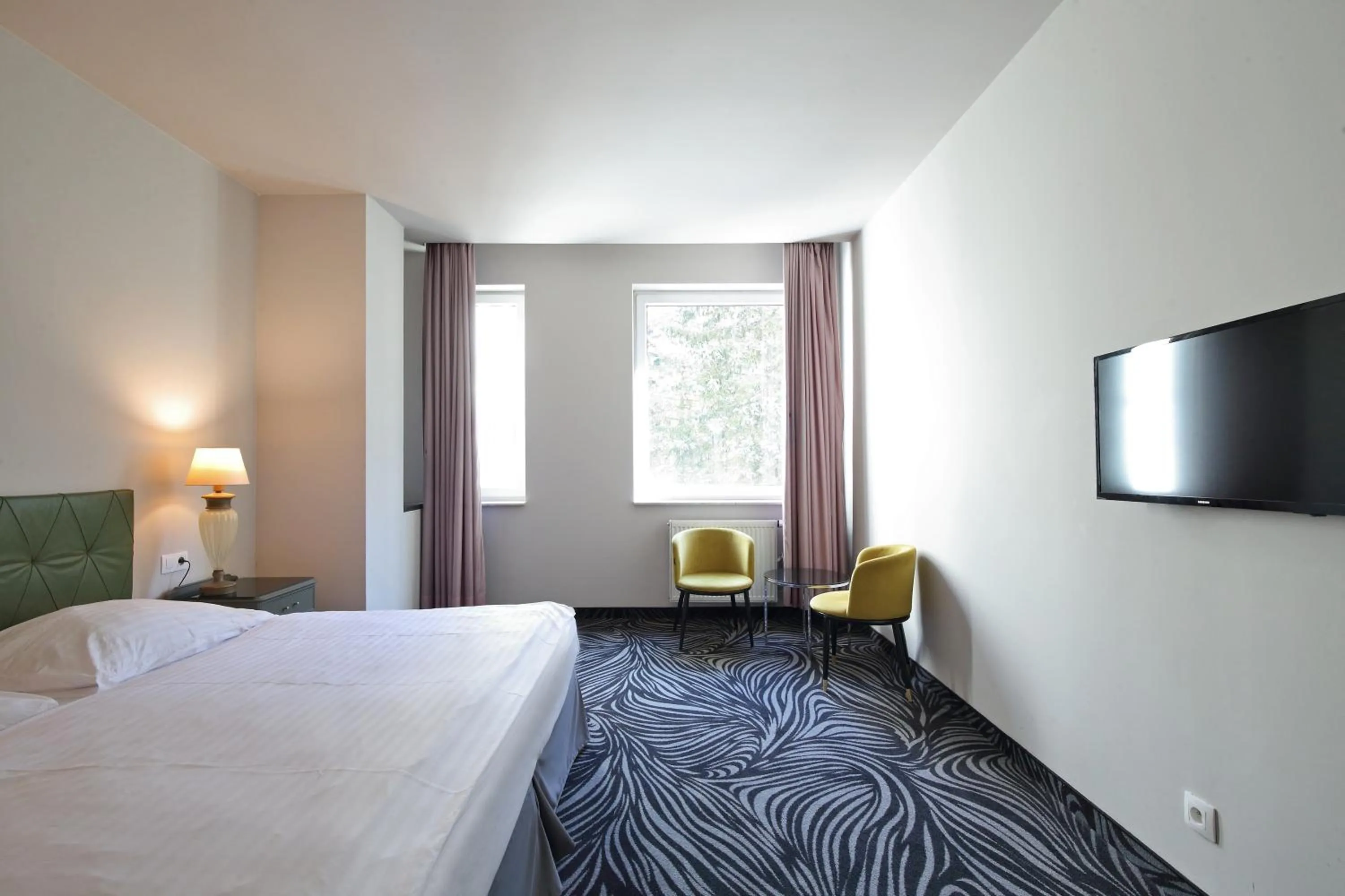 Bedroom, Bed in Carlsbad INN hotel & apartments