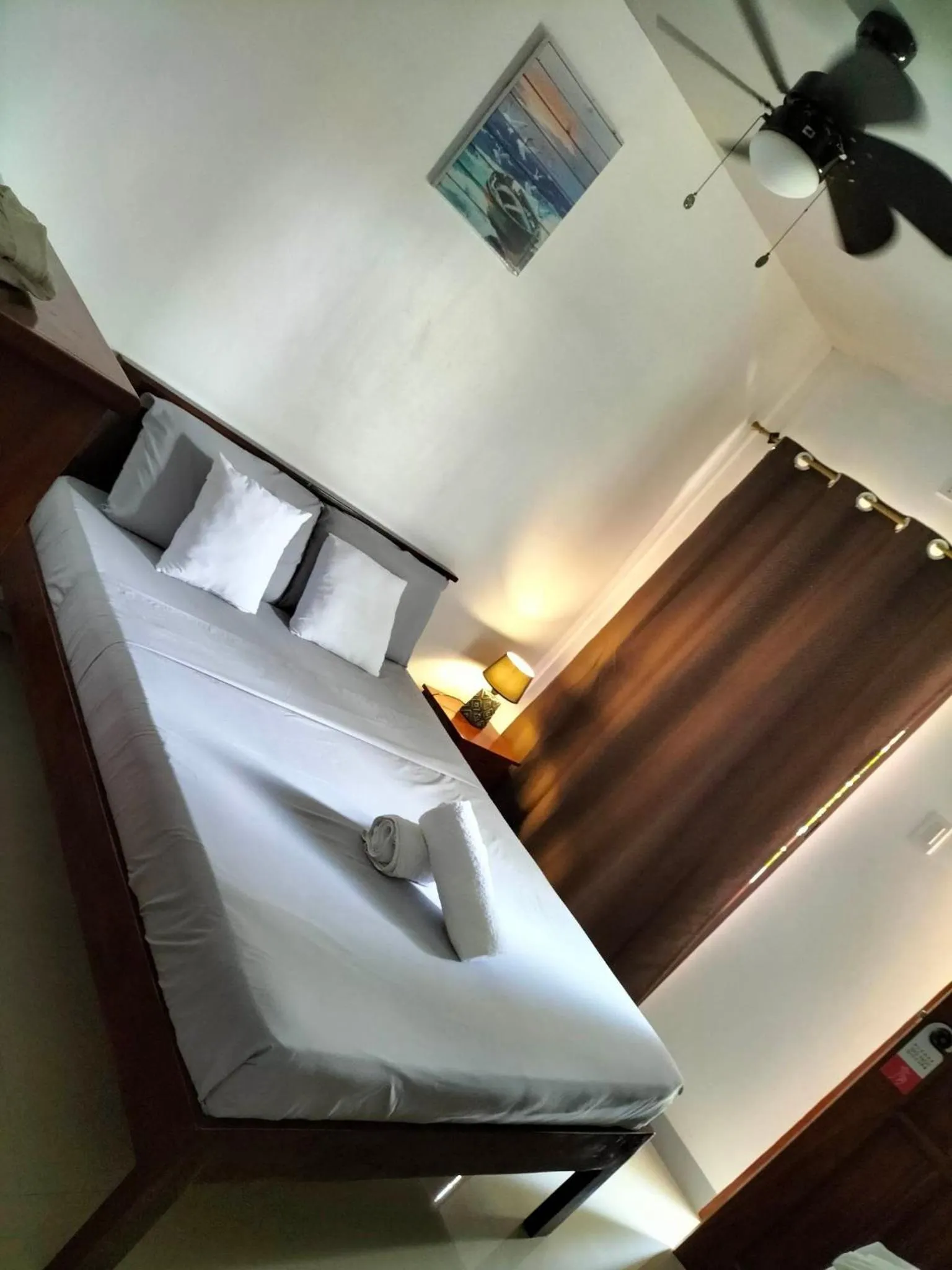 Bed in Garden Village Resort