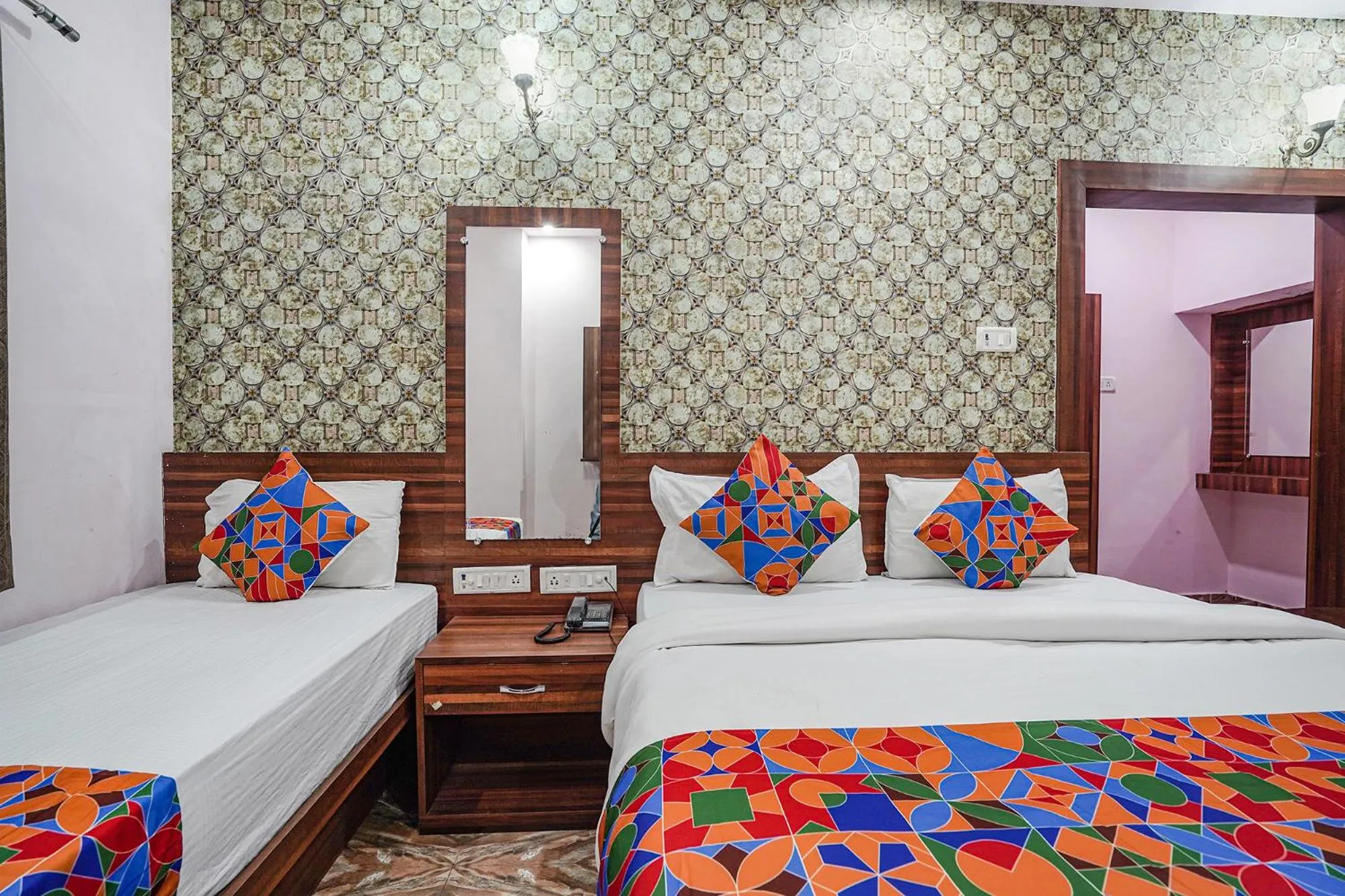 Bed in FabHotel Deepak Palace
