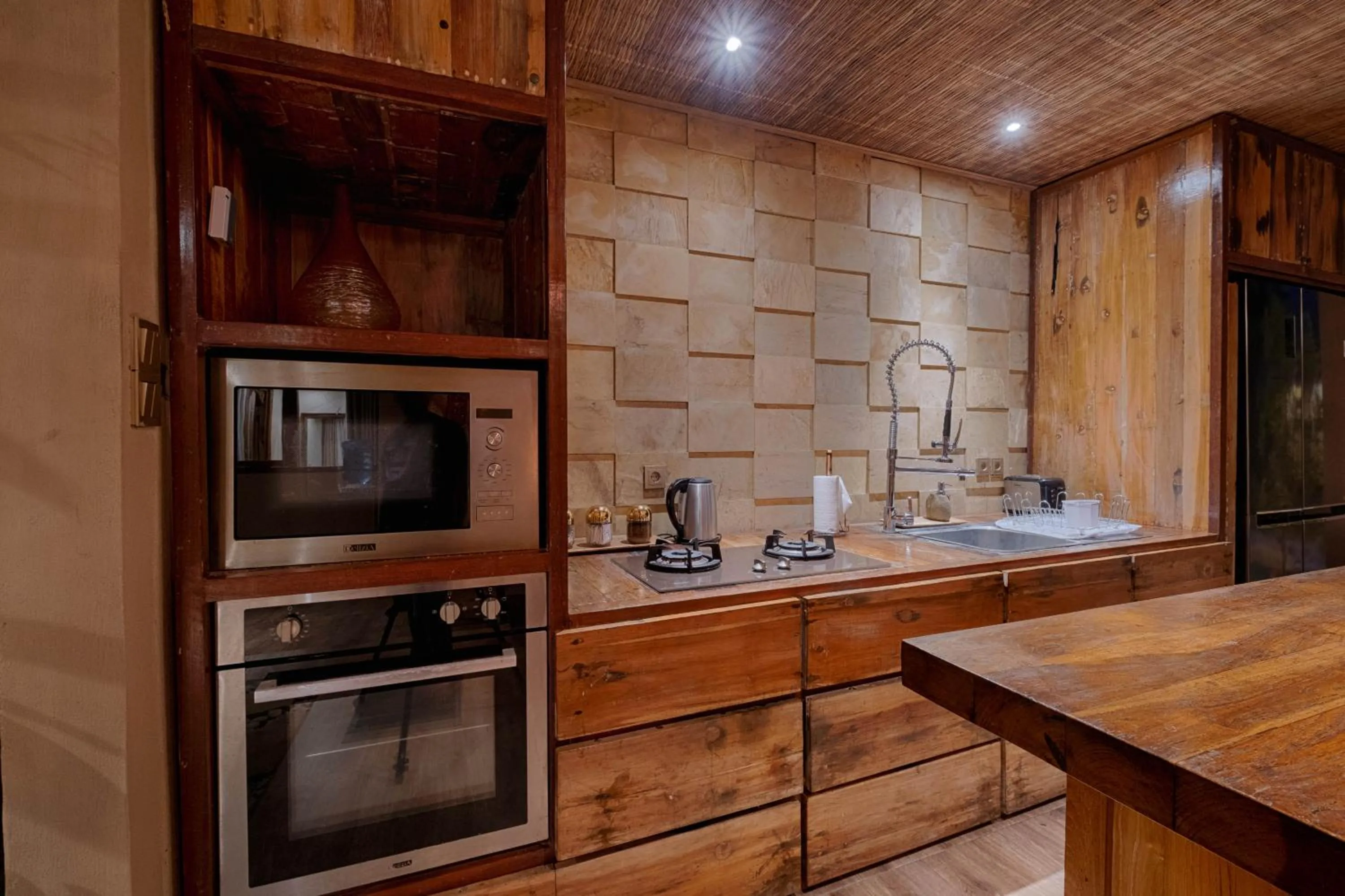 Kitchen or kitchenette in Mas Ubud Villa by Sanga Sanga Hospitality