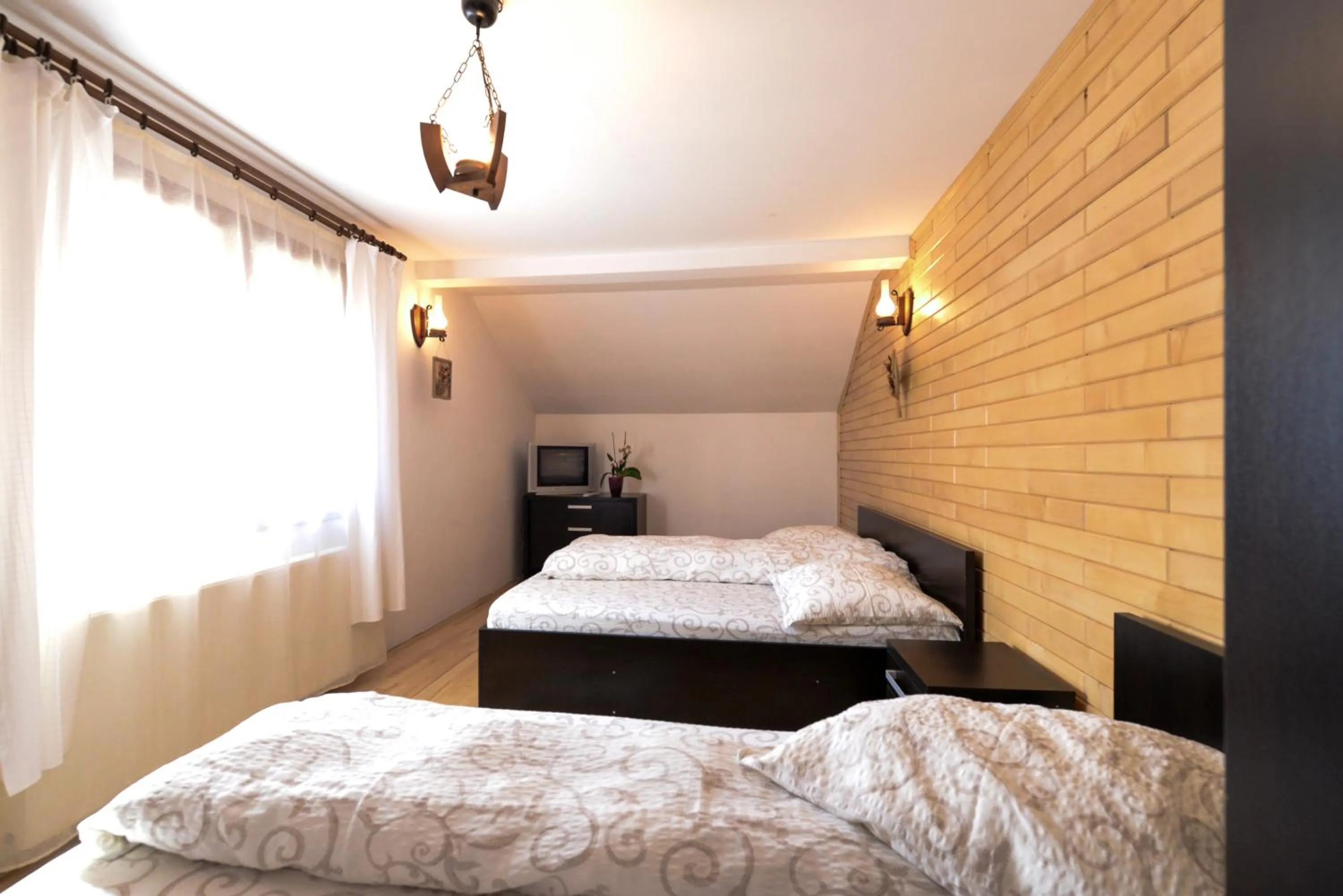 Photo of the whole room, Bed in Pensiunea Arina