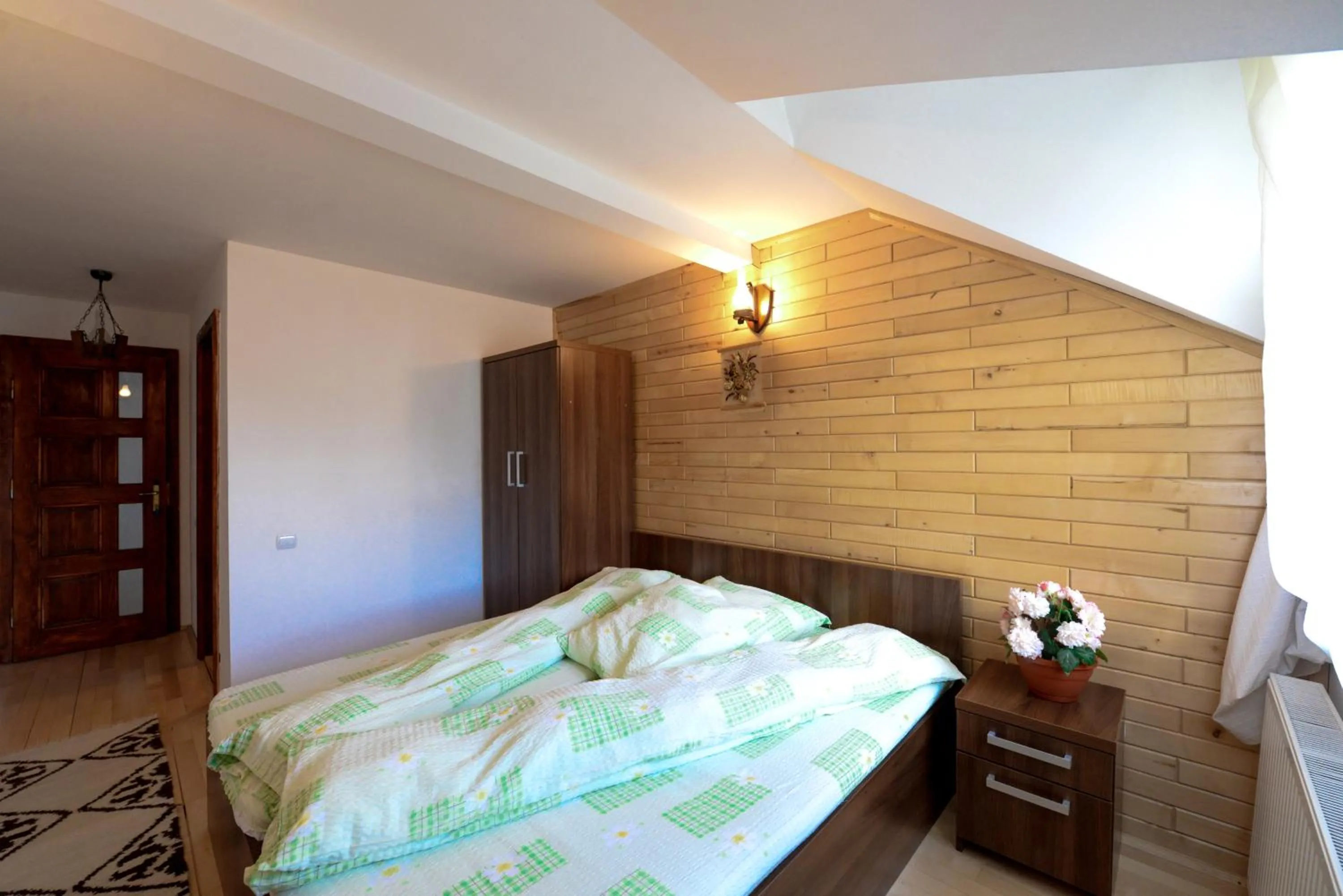 Photo of the whole room, Bed in Pensiunea Arina
