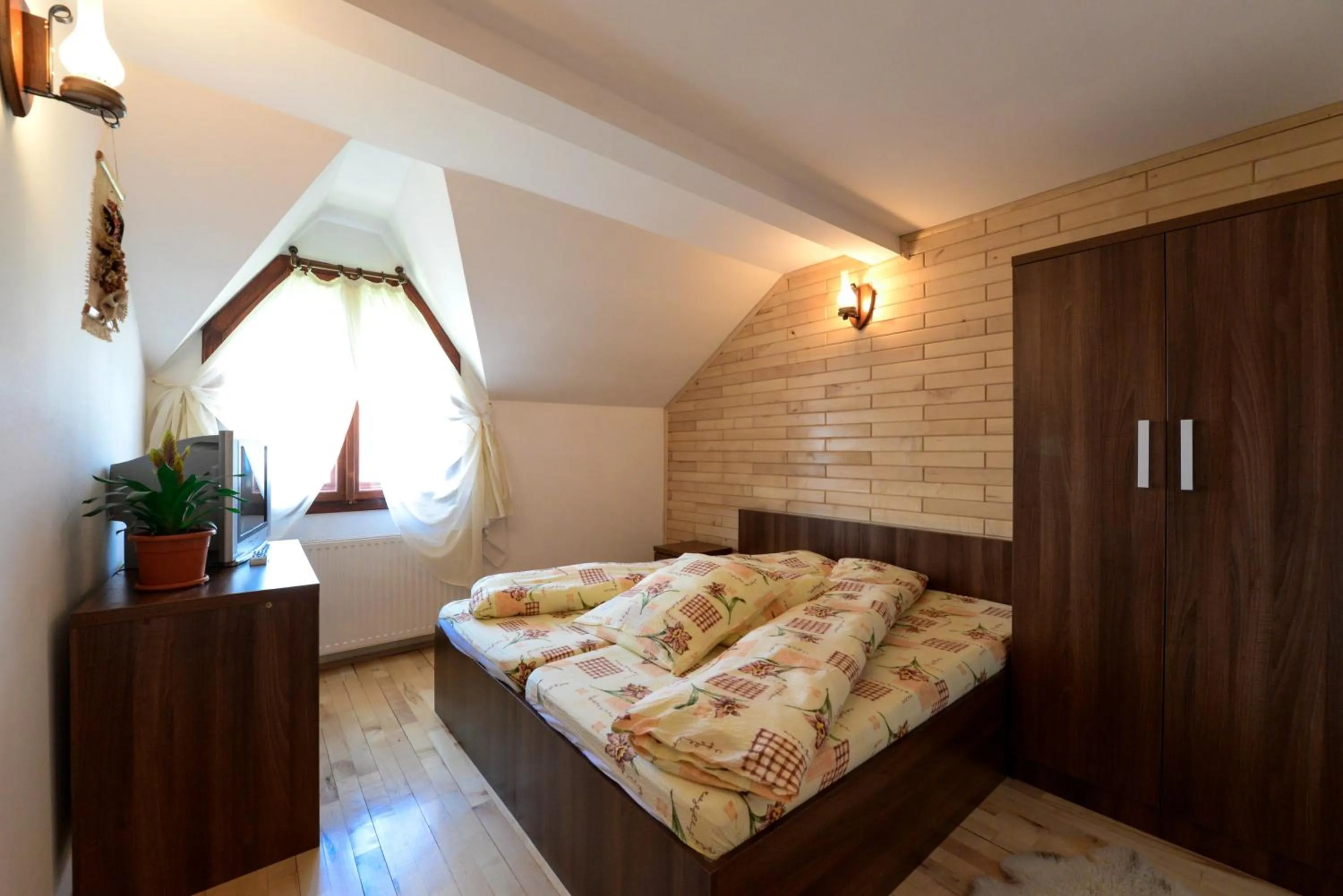 Photo of the whole room, Bed in Pensiunea Arina