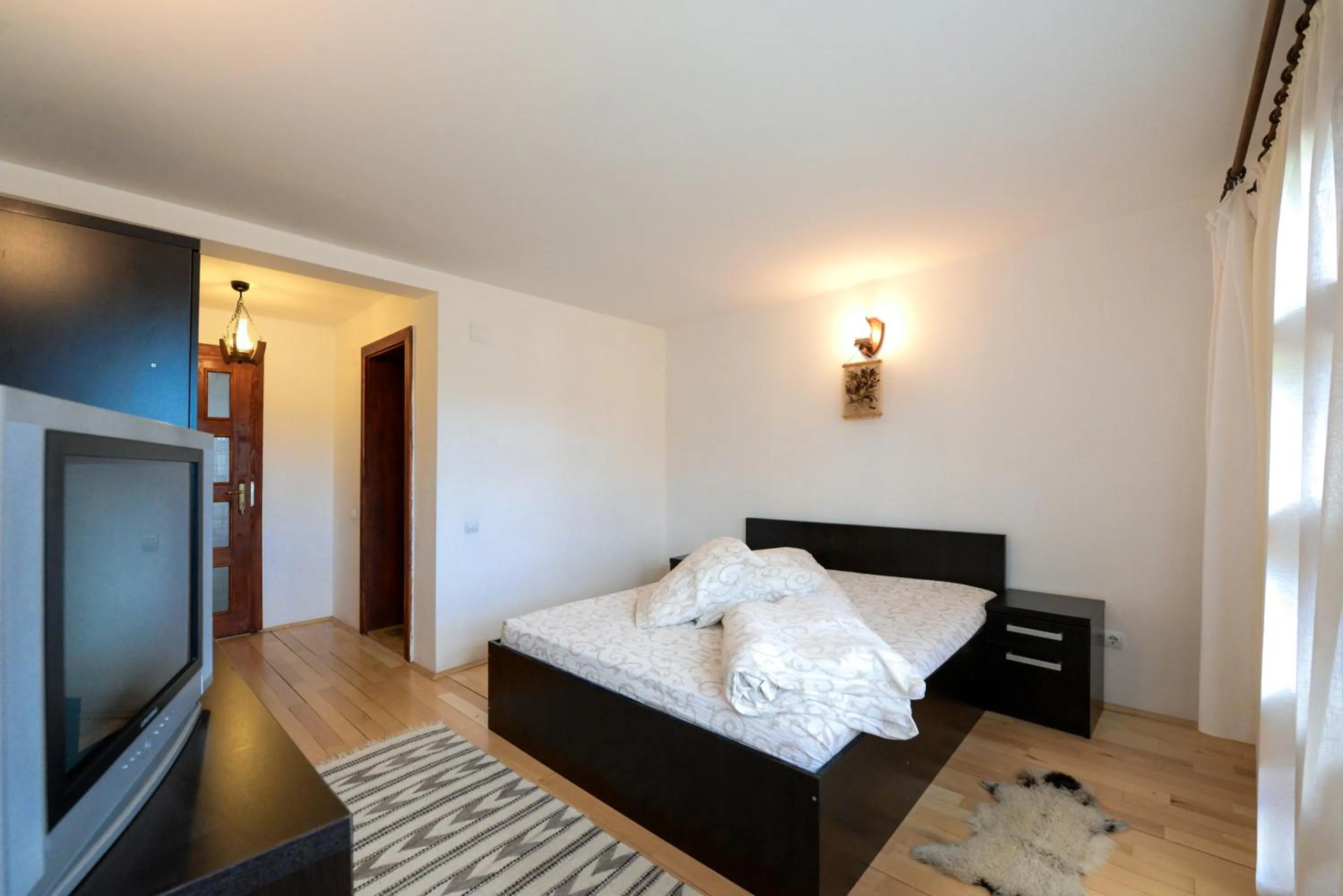 Photo of the whole room, Bed in Pensiunea Arina