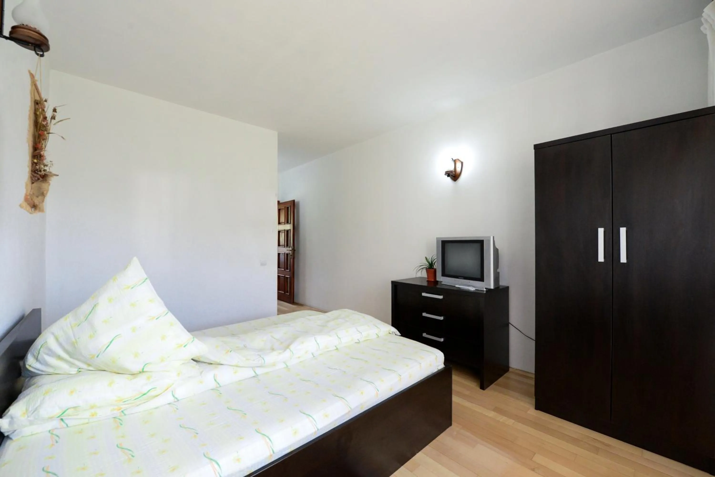 Photo of the whole room, Bed in Pensiunea Arina
