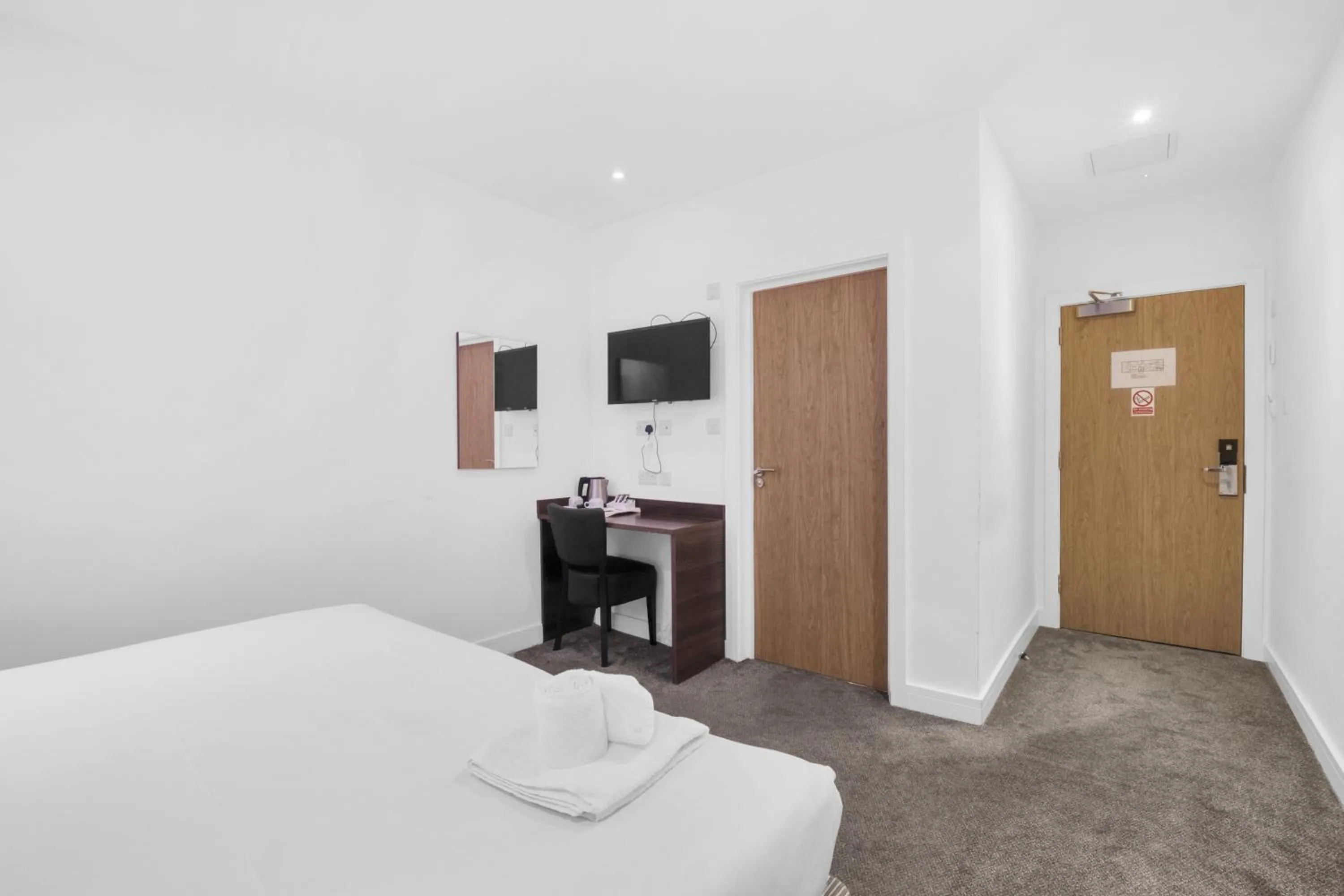 Bed in Signature Hotel London