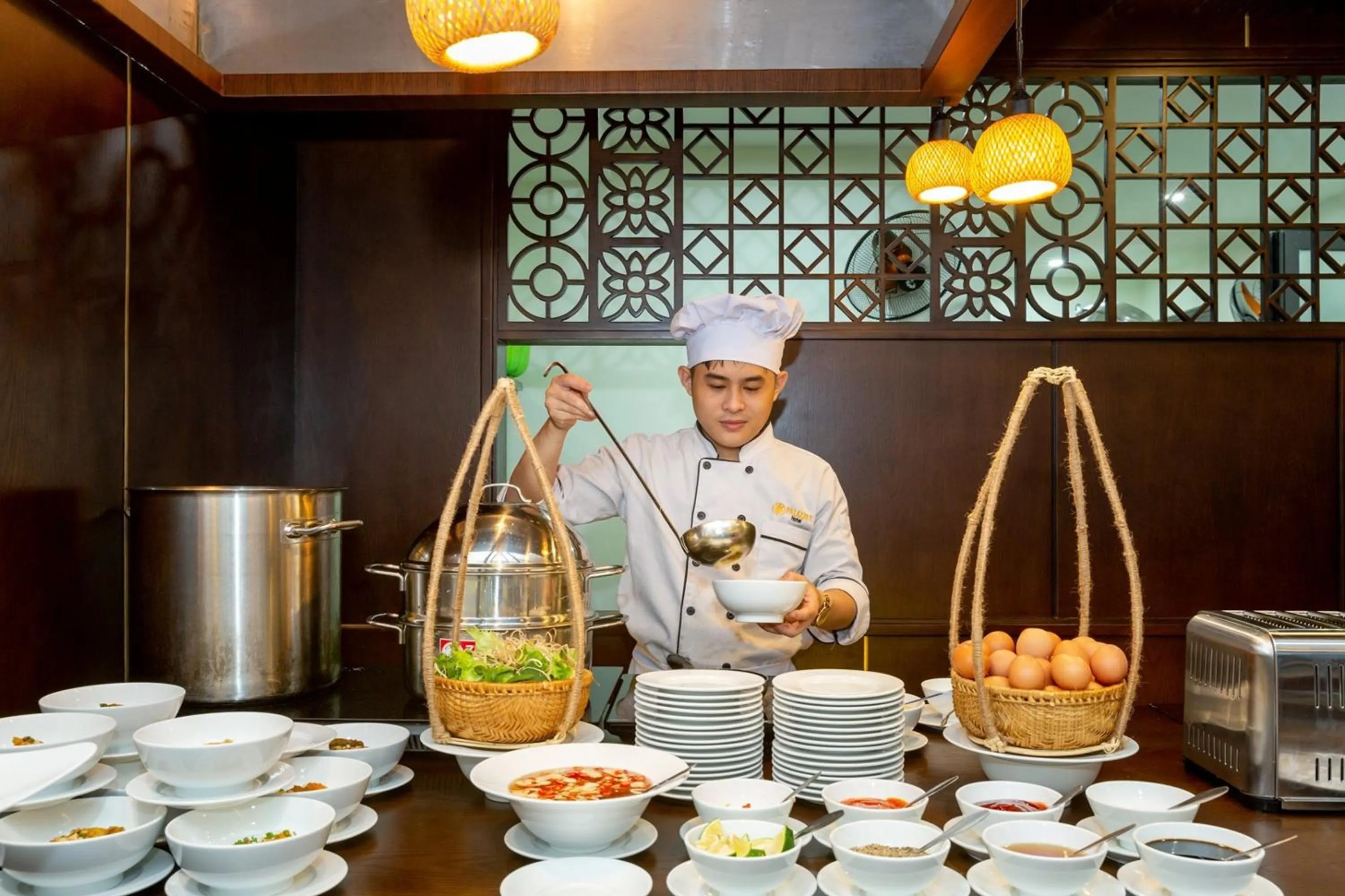 People in Palazzo Luxury Hotel & Bistro - Central My Khe Beach Walking Street