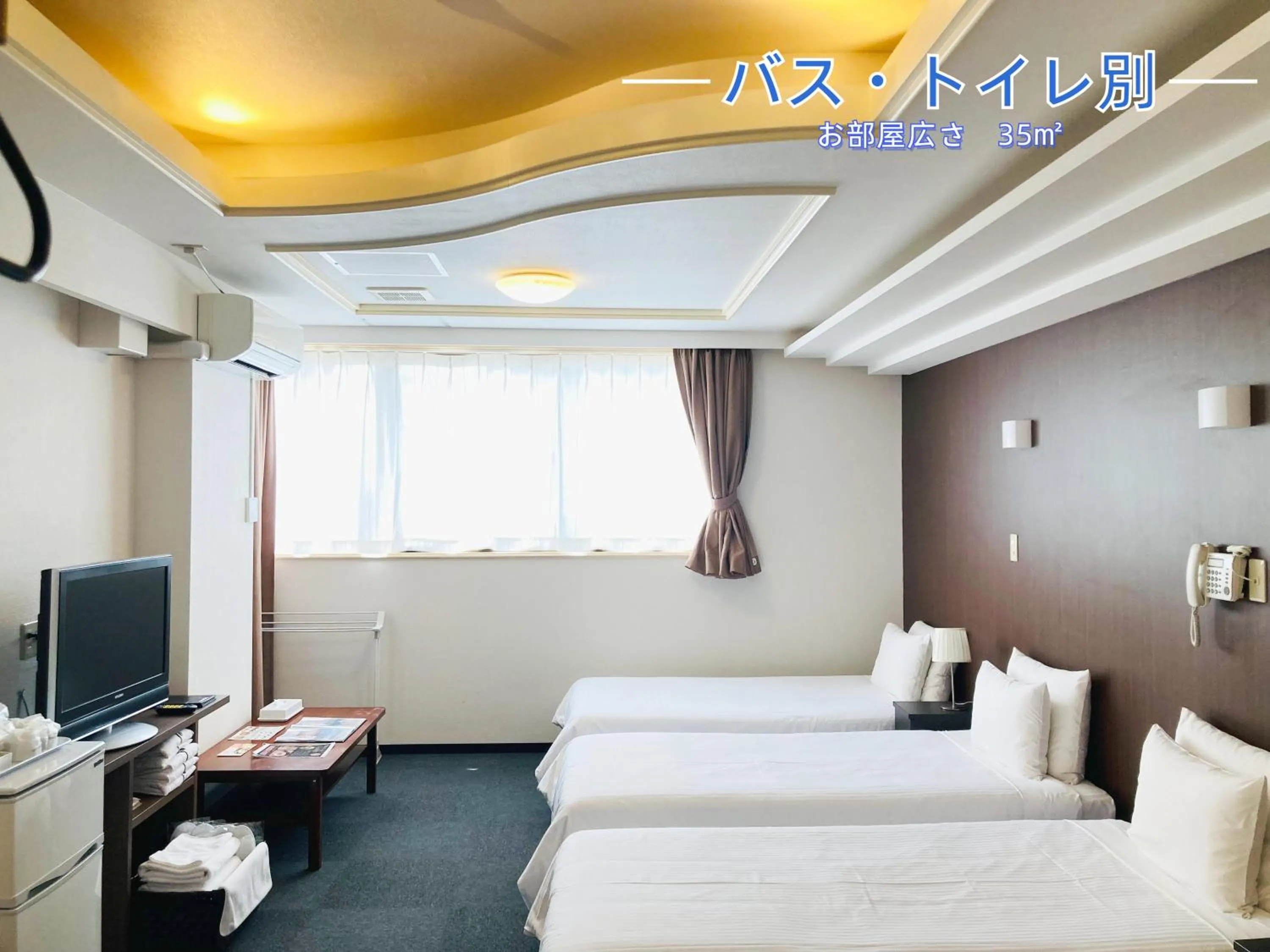 Photo of the whole room, Bed in Okinawa Hotel Precia