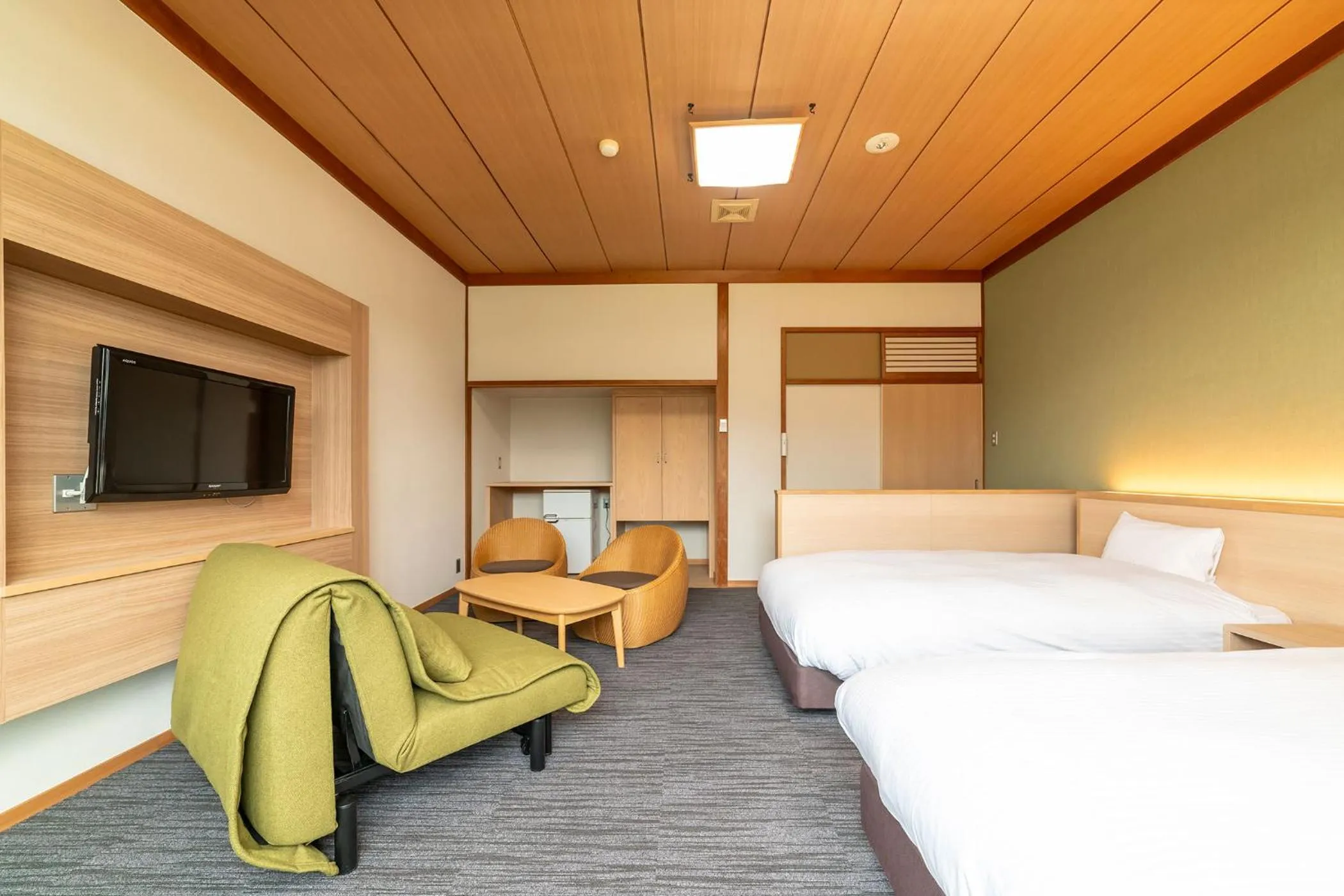 Photo of the whole room, Bed in Ooedo Onsen Monogatari Premium Kinosaki