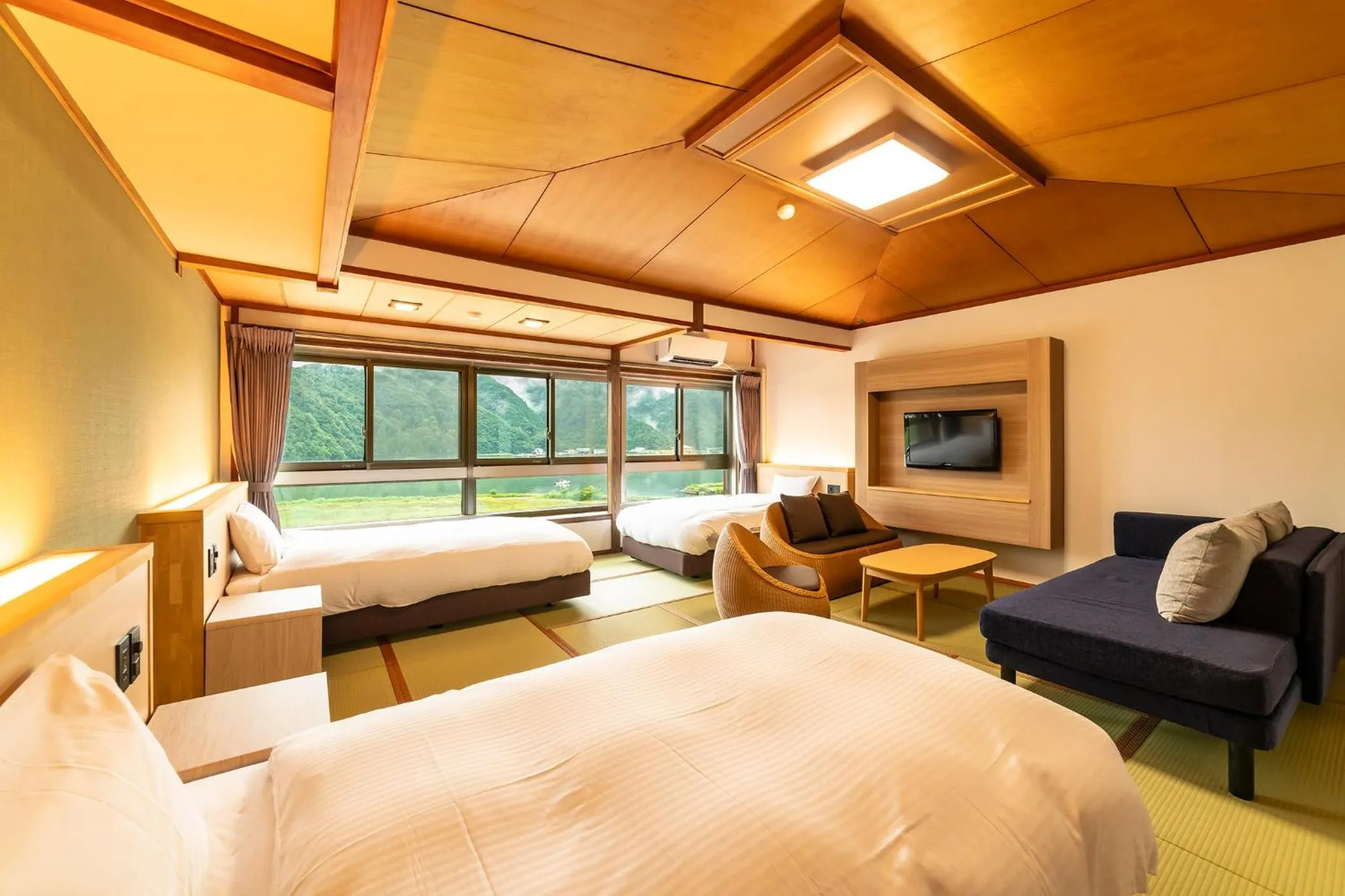 Photo of the whole room, Bed in Ooedo Onsen Monogatari Premium Kinosaki