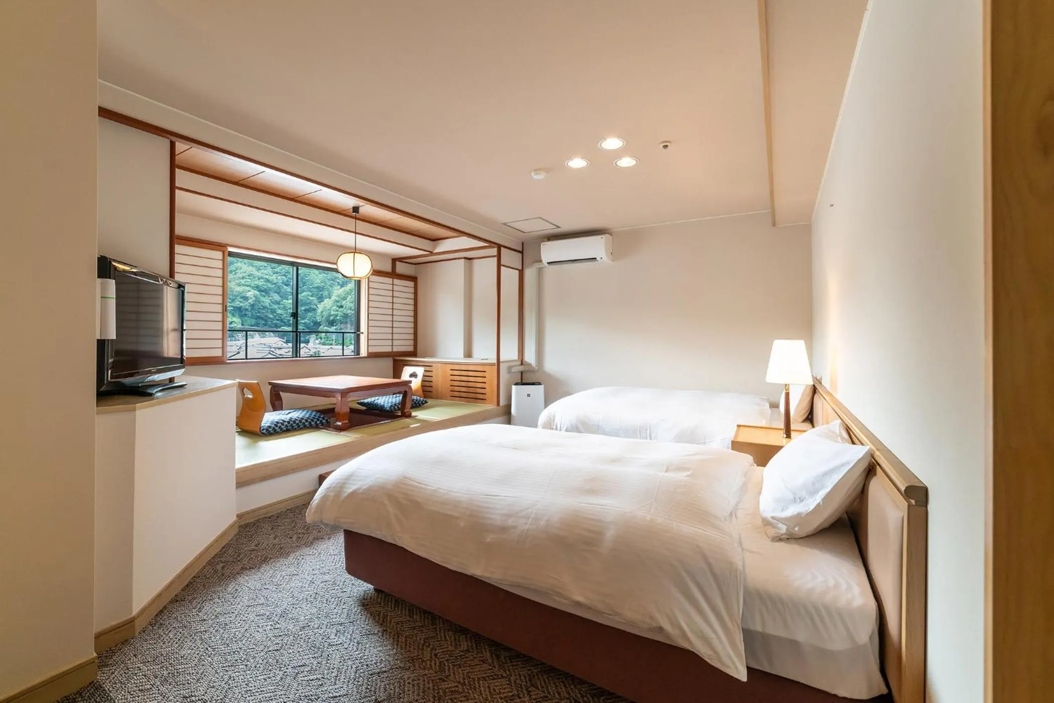 Photo of the whole room, Bed in Ooedo Onsen Monogatari Premium Kinosaki