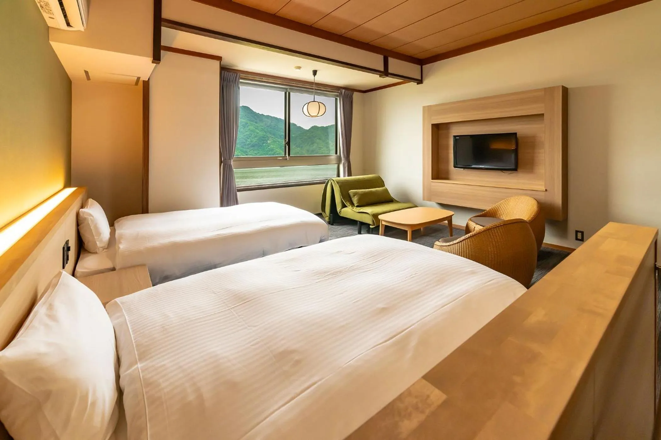 Photo of the whole room, Bed in Ooedo Onsen Monogatari Premium Kinosaki