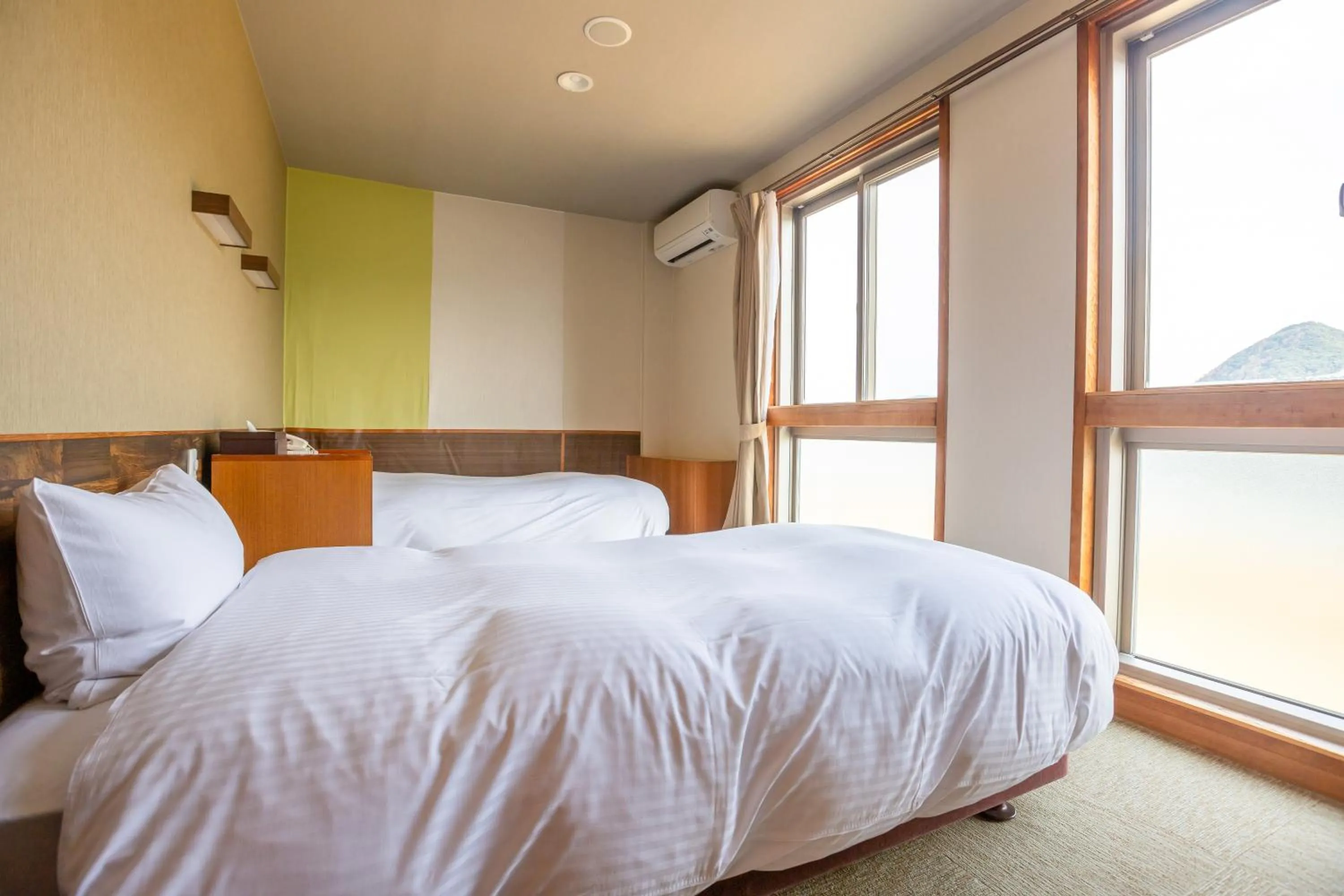Photo of the whole room, Bed in Ooedo Onsen Monogatari Premium Kinosaki