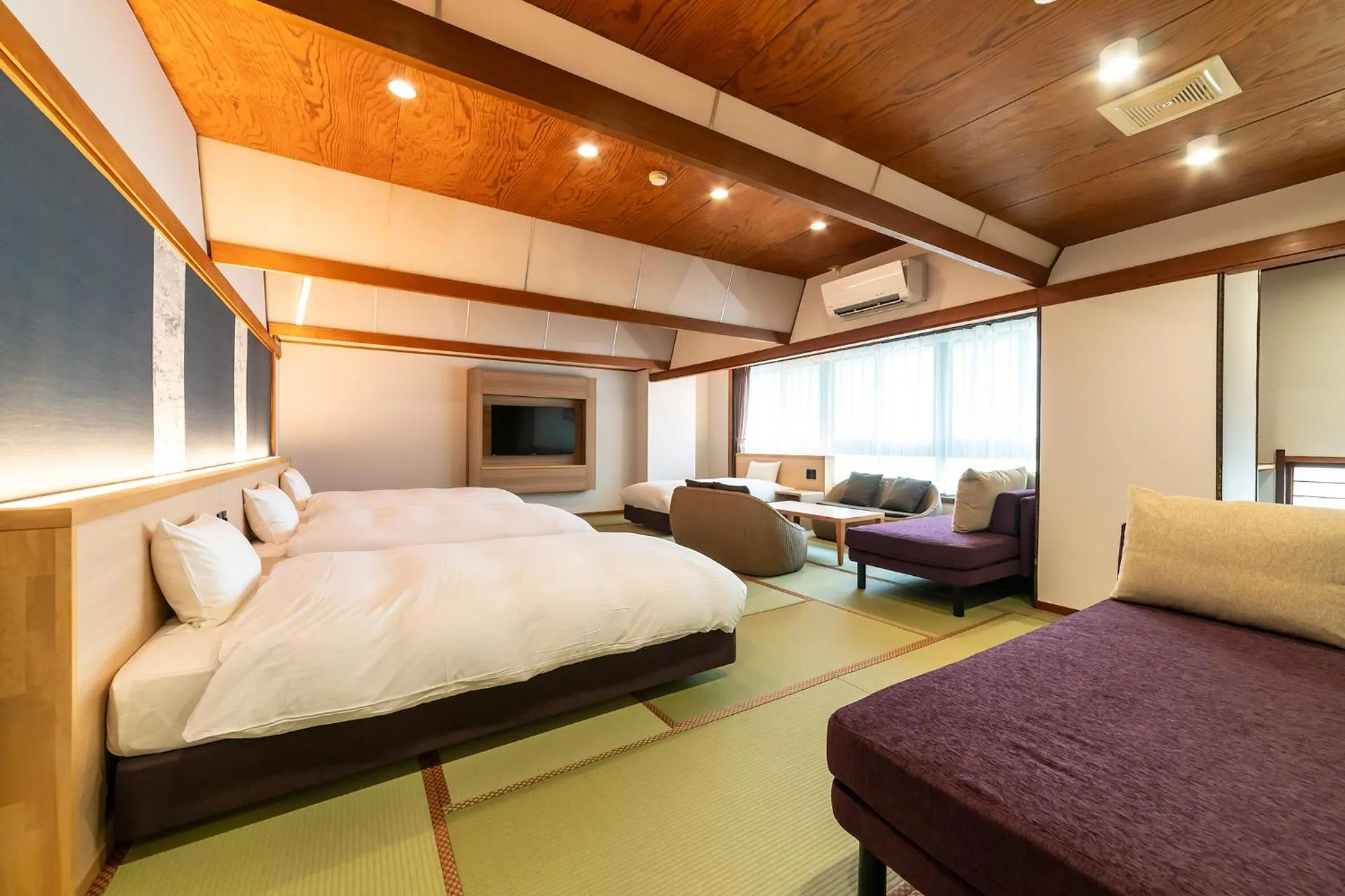 Photo of the whole room, Bed in Ooedo Onsen Monogatari Premium Kinosaki