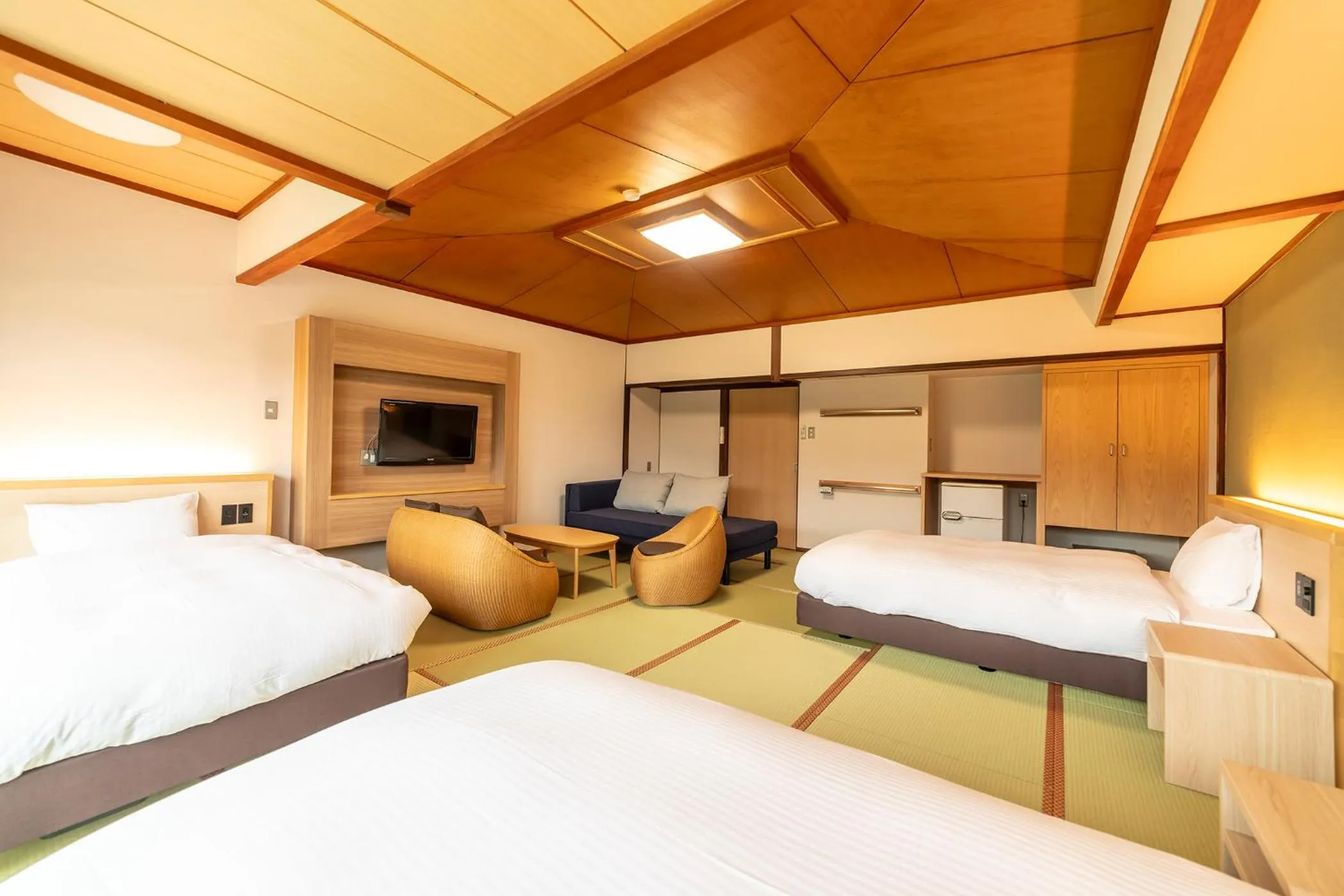 Photo of the whole room, Bed in Ooedo Onsen Monogatari Premium Kinosaki