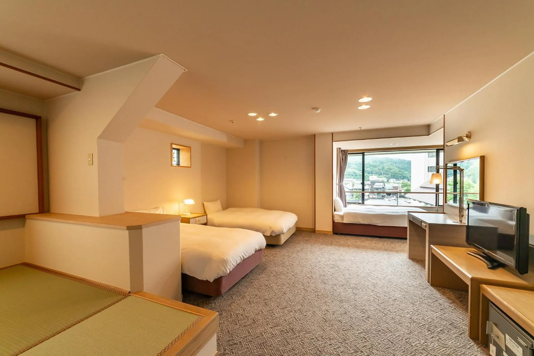 Photo of the whole room, Bed in Ooedo Onsen Monogatari Premium Kinosaki