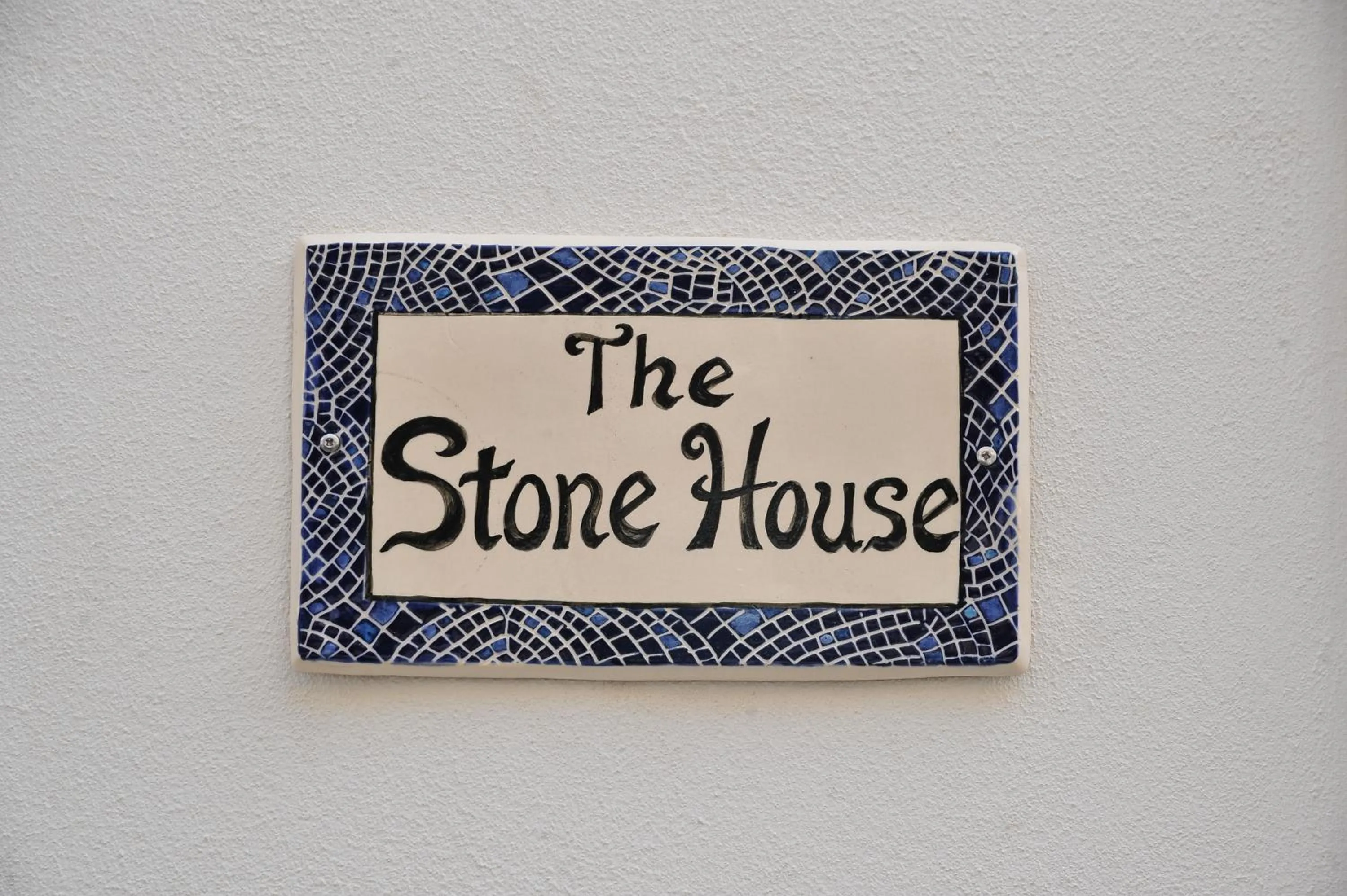 Property logo or sign in The Stonehouse
