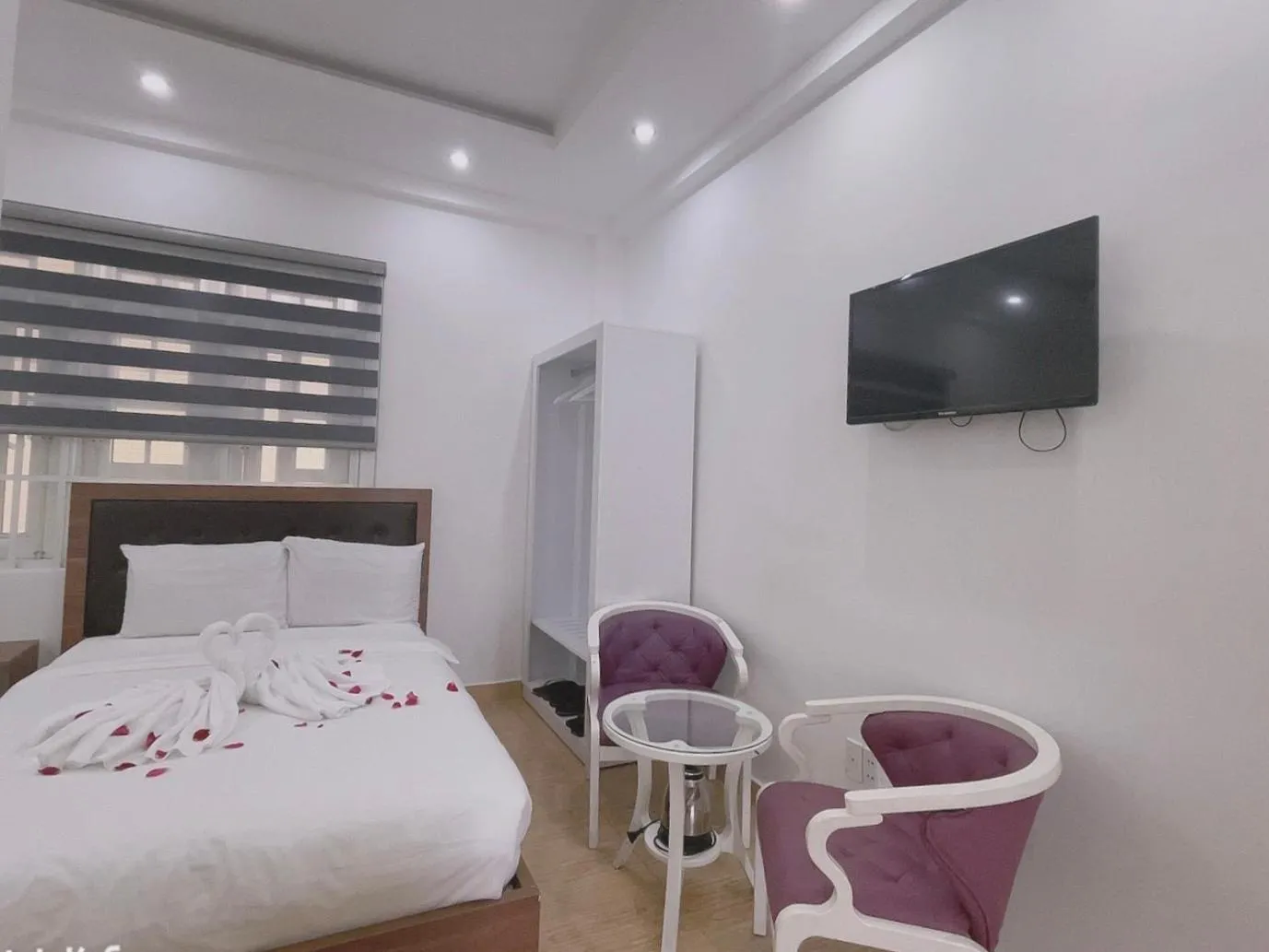 Communal lounge/ TV room, Bed in Phuong Vy Hotel