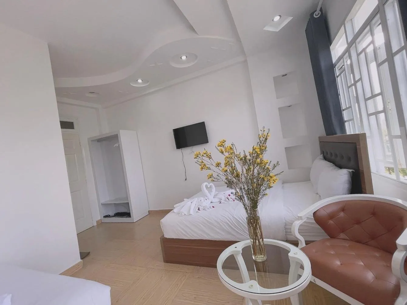 Communal lounge/ TV room, Bed in Phuong Vy Hotel