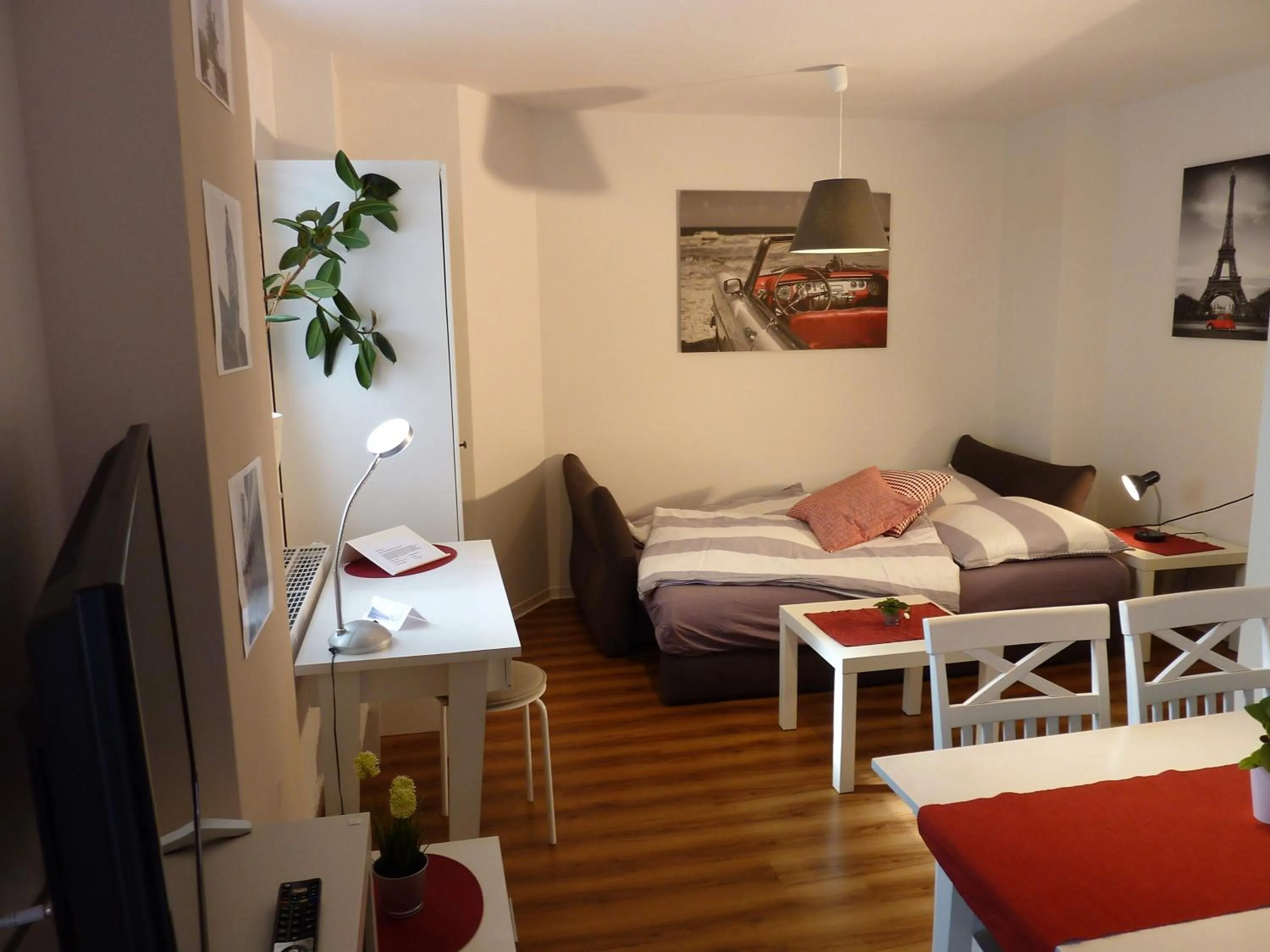 Living room, Bed in City Apartment Jena