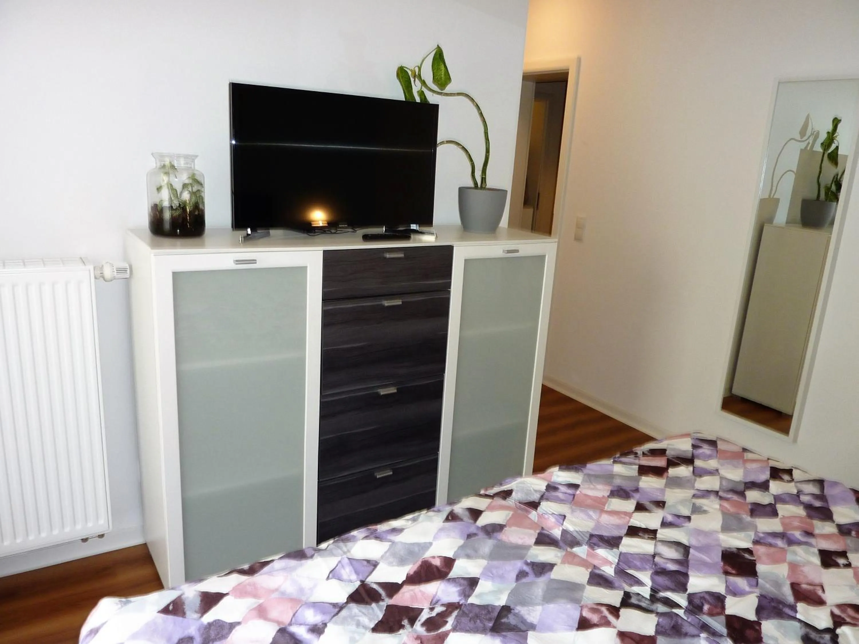 TV and multimedia, Bed in City Apartment Jena