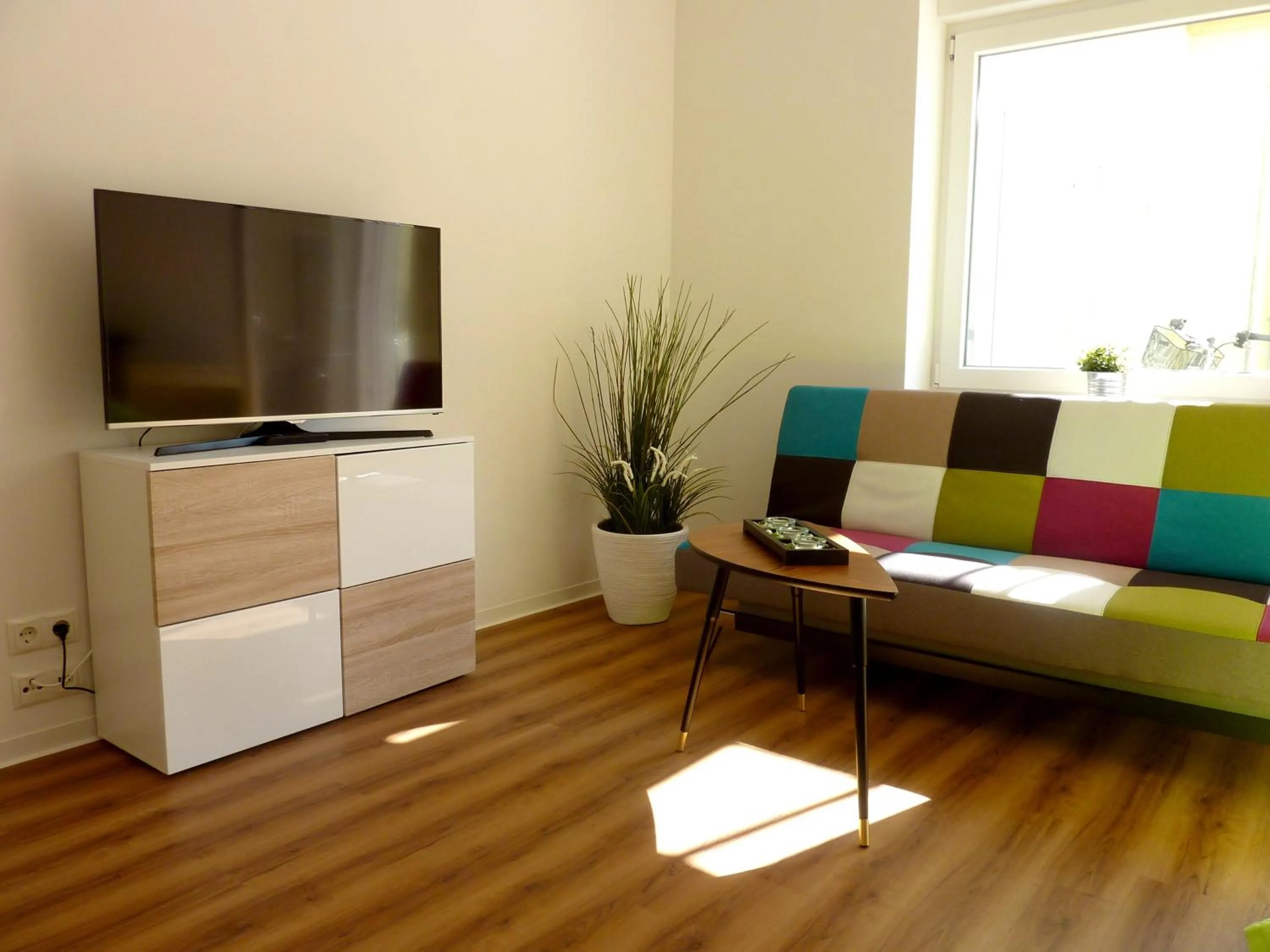 Photo of the whole room in City Apartment Jena