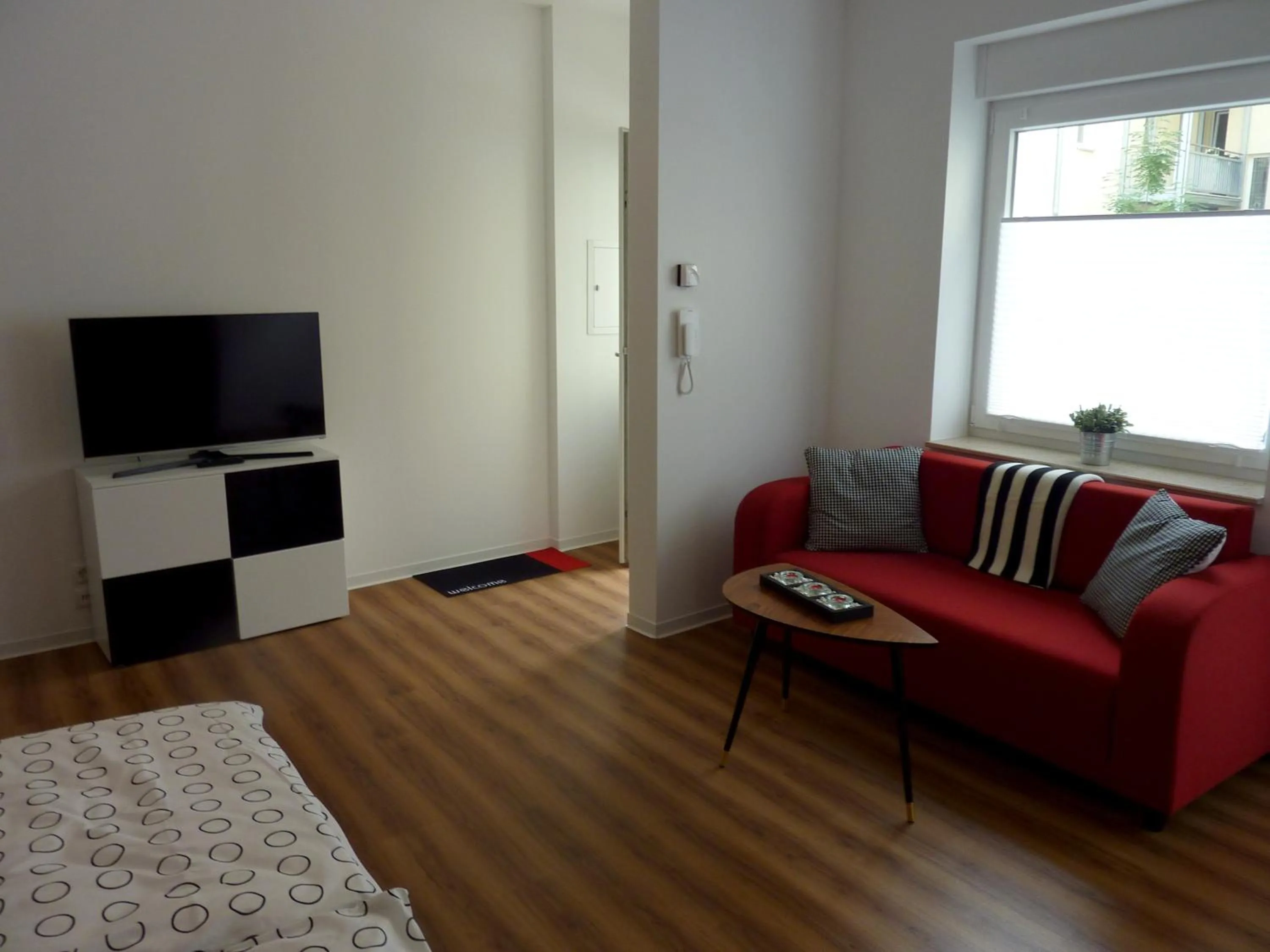 Photo of the whole room in City Apartment Jena