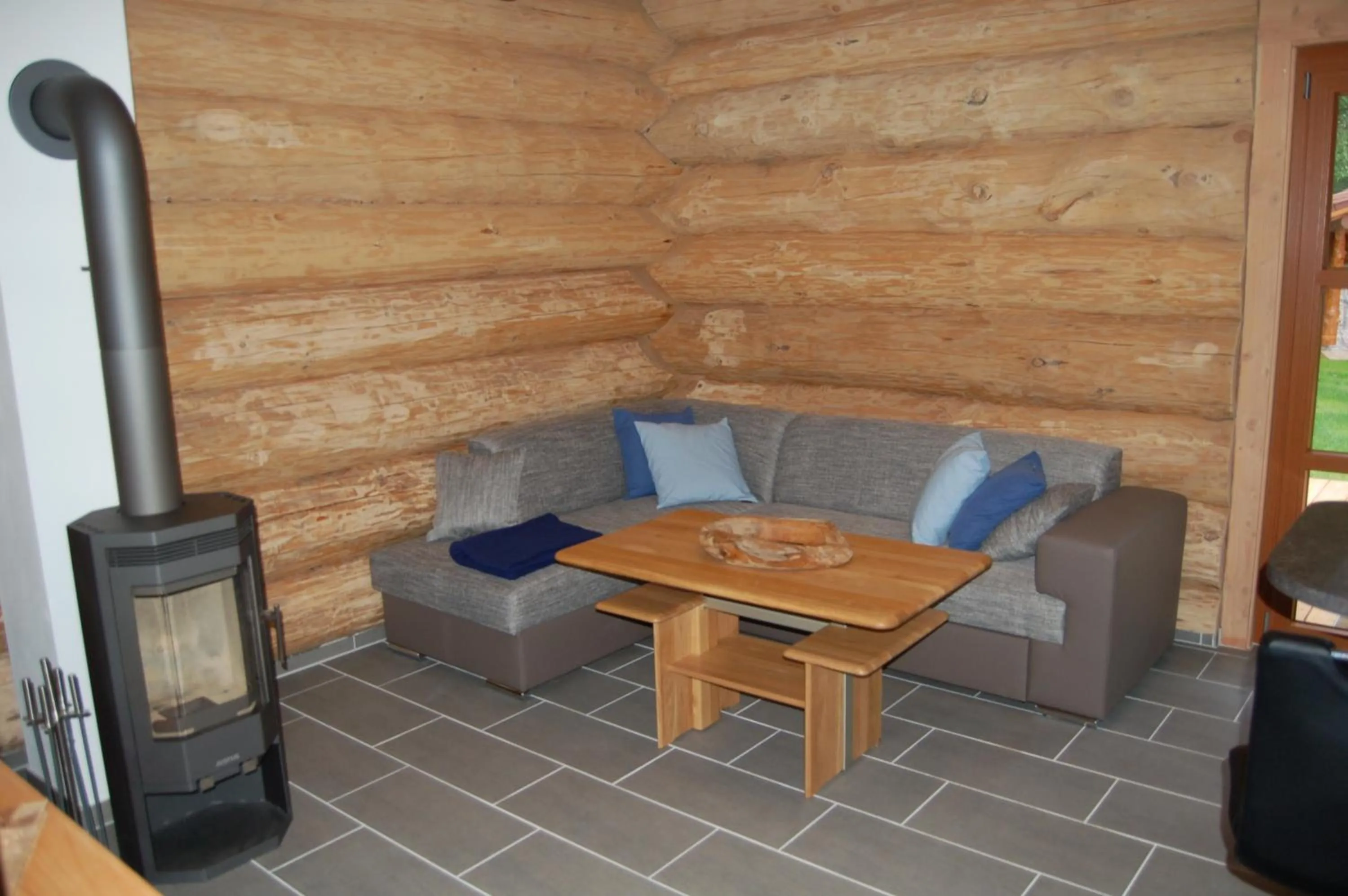 Living room in Naturstamm Ferienhaus