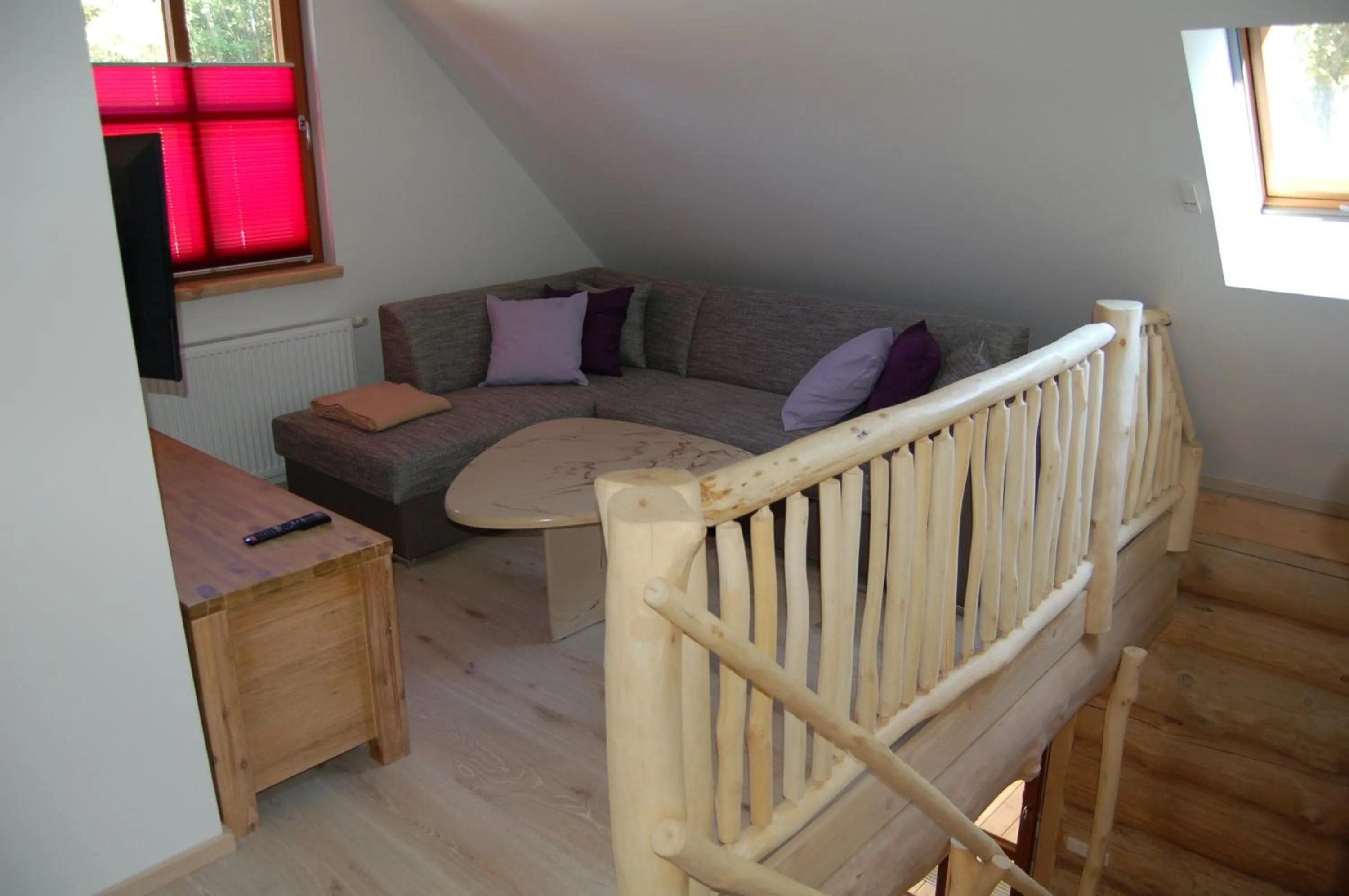 Living room, Bed in Naturstamm Ferienhaus