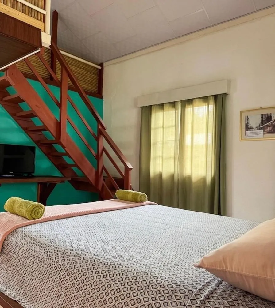 Bed in Rainforest Yasmin Hotel