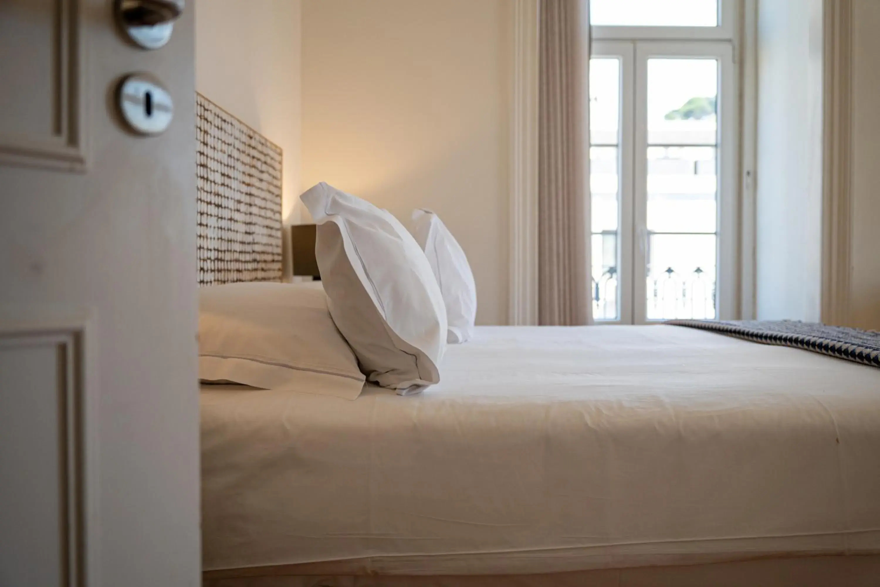 Bed in Tesouro da Baixa by Shiadu Bed in Tesouro da Baixa by Shiadu