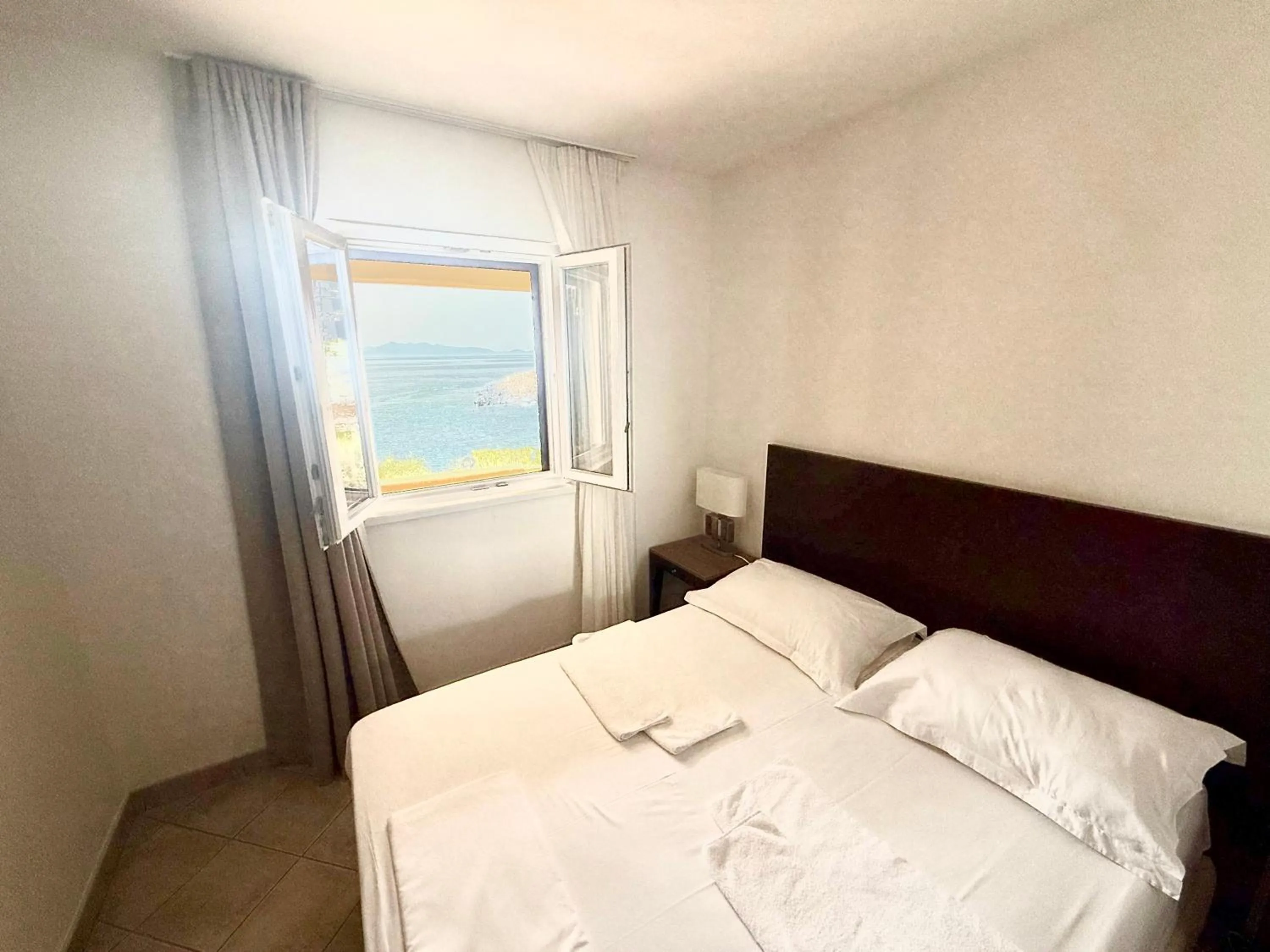 Bedroom, Bed in Hotel Priscapac Resort & Apartments