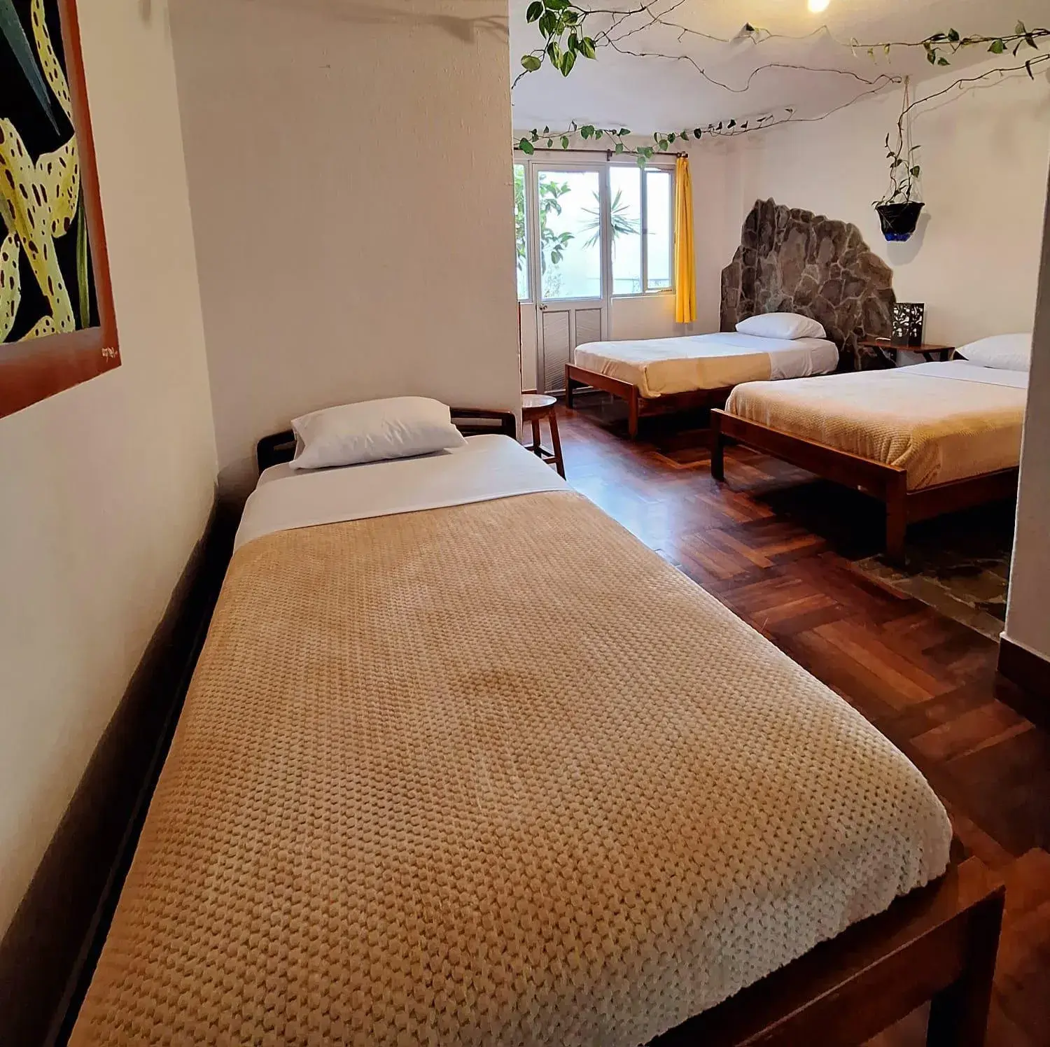 Triple Room in Hostal Chimenea Triple Room in Hostal Chimenea